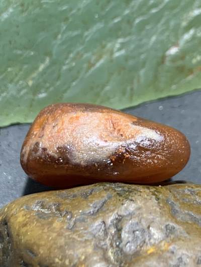 精美荔枝冻柿子红水冲籽川料南红玛瑙原石一颗 精美荔枝冻柿子红水冲籽川料南红玛瑙原石一颗