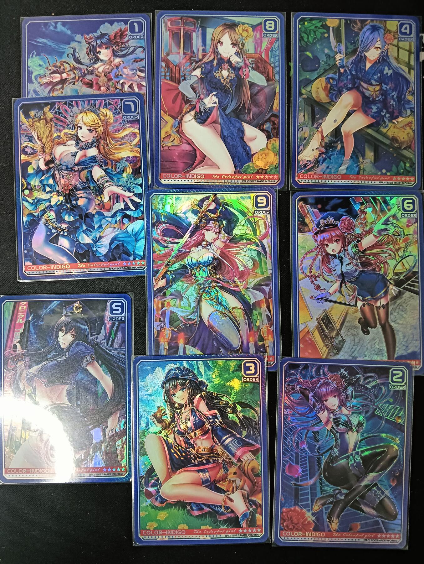 花开卡拍第61期（3月7号周六截拍，品控勿拍!!!拍品不寄存，运费5元（新疆需补运费差价或顺丰到付），自制卡难免瑕疵，可能存在轻微撞角爆边等出厂瑕疵，品控介意勿拍！） 驴打滚 斑斓少女 蓝 1套9张 彩闪