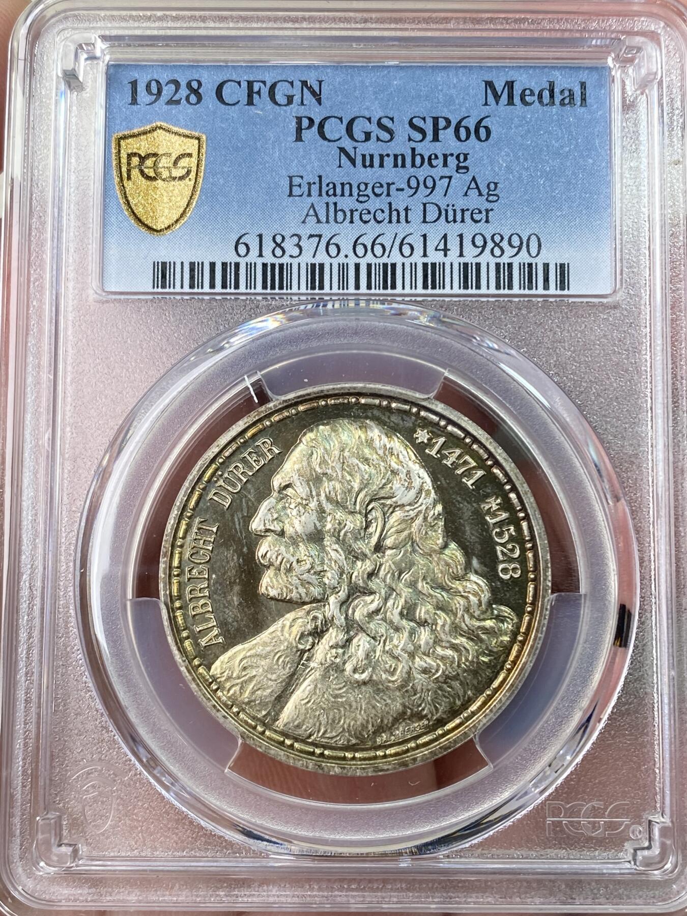 万国钱币拍卖第062期 PCGS SP66 1928年德国纽伦堡版画画圣丢勒逝世400周年纪念银章 精铸镜面满满喷砂质感 绚烂晚霞金彩原味包浆环绕 丢勒系列最精美绝伦品种没有之一 PCGS亚军分官网广告图顶级收藏品质