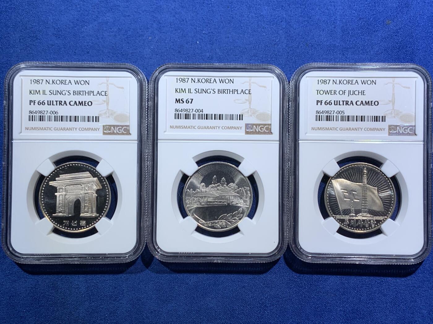 《竞宝斋》第466场 周日，周一 2场连拍 （全场包邮）欢迎送拍 三枚一组 NGC MS67/PF66 朝鲜1987年镍币 三雄精制与普制镍币。主体思想塔/凯旋门/万景台故居 精制的少见！