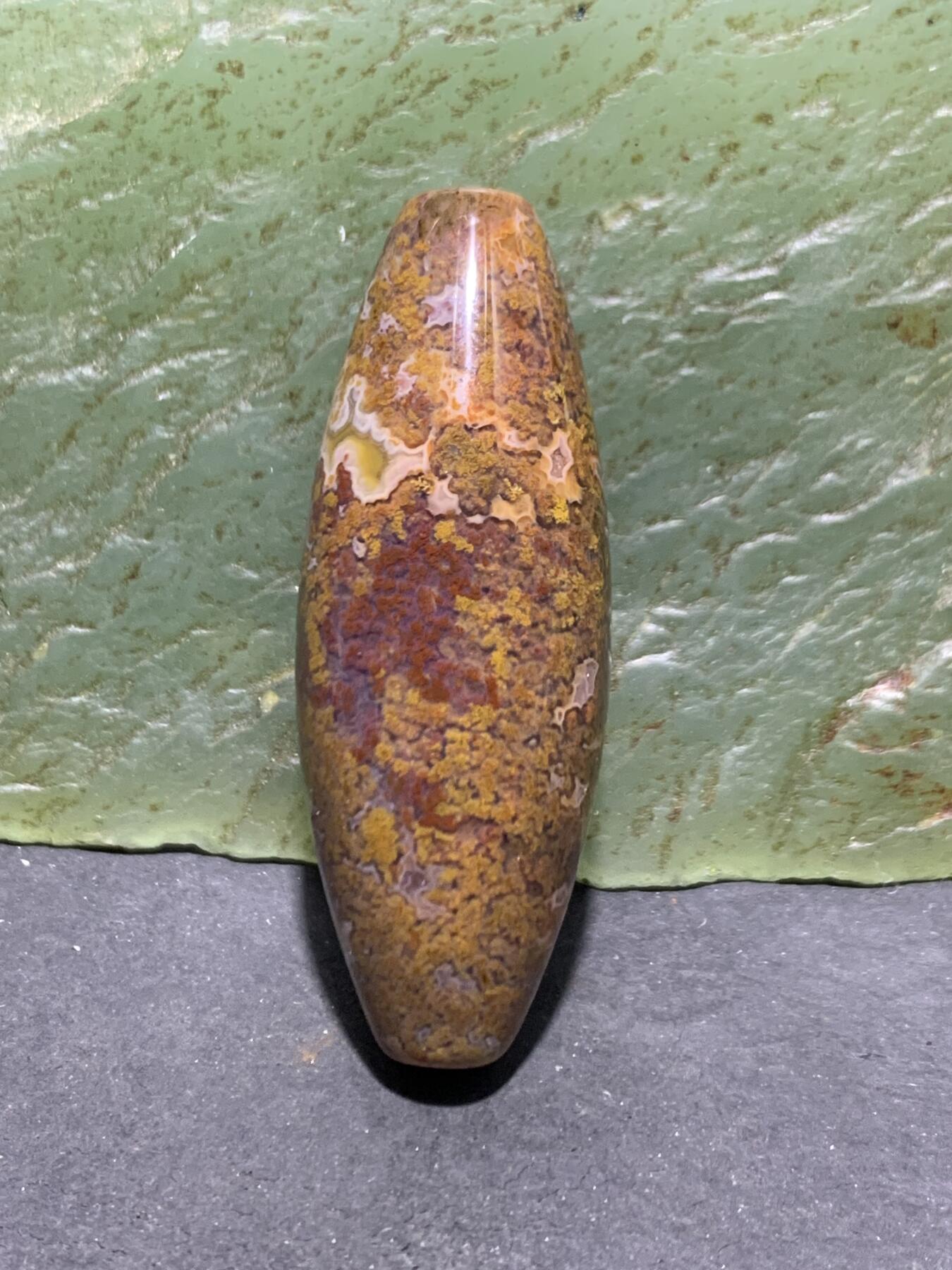 精美罕见冻料草花纹战国红玛瑙天珠形随形桶珠一个，