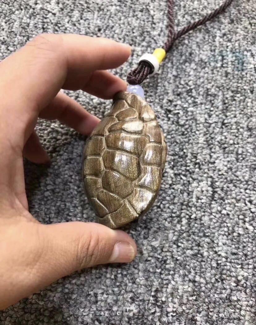 金丝楠阴沉木黄料精雕手把件～富甲天下