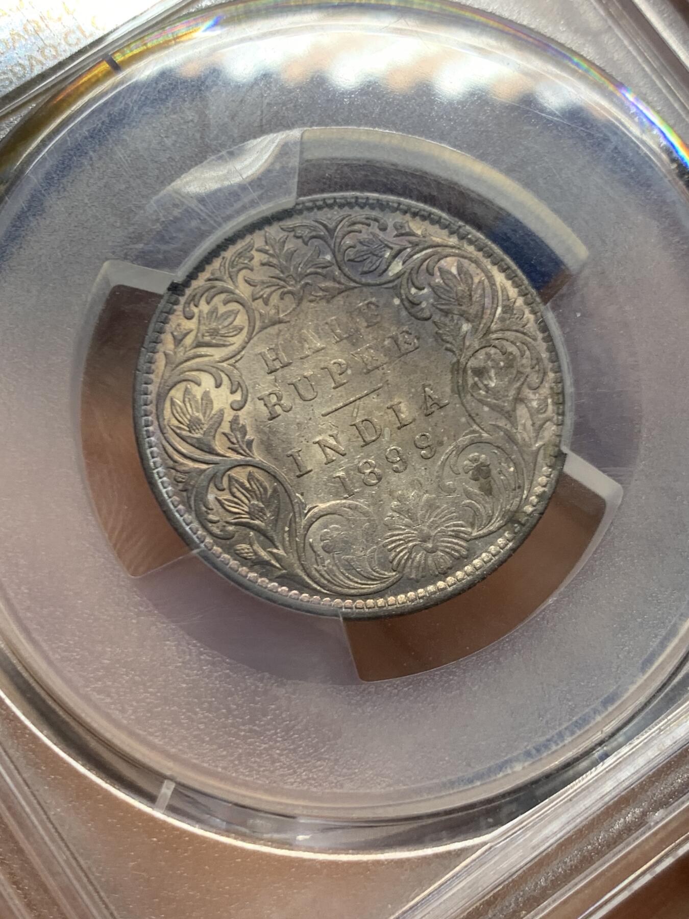 《竞宝斋》第466场 周日，周一 2场连拍 （全场包邮）欢迎送拍 PCGS AU53 英属印度1899-B半卢比，酱彩包浆，较少见。