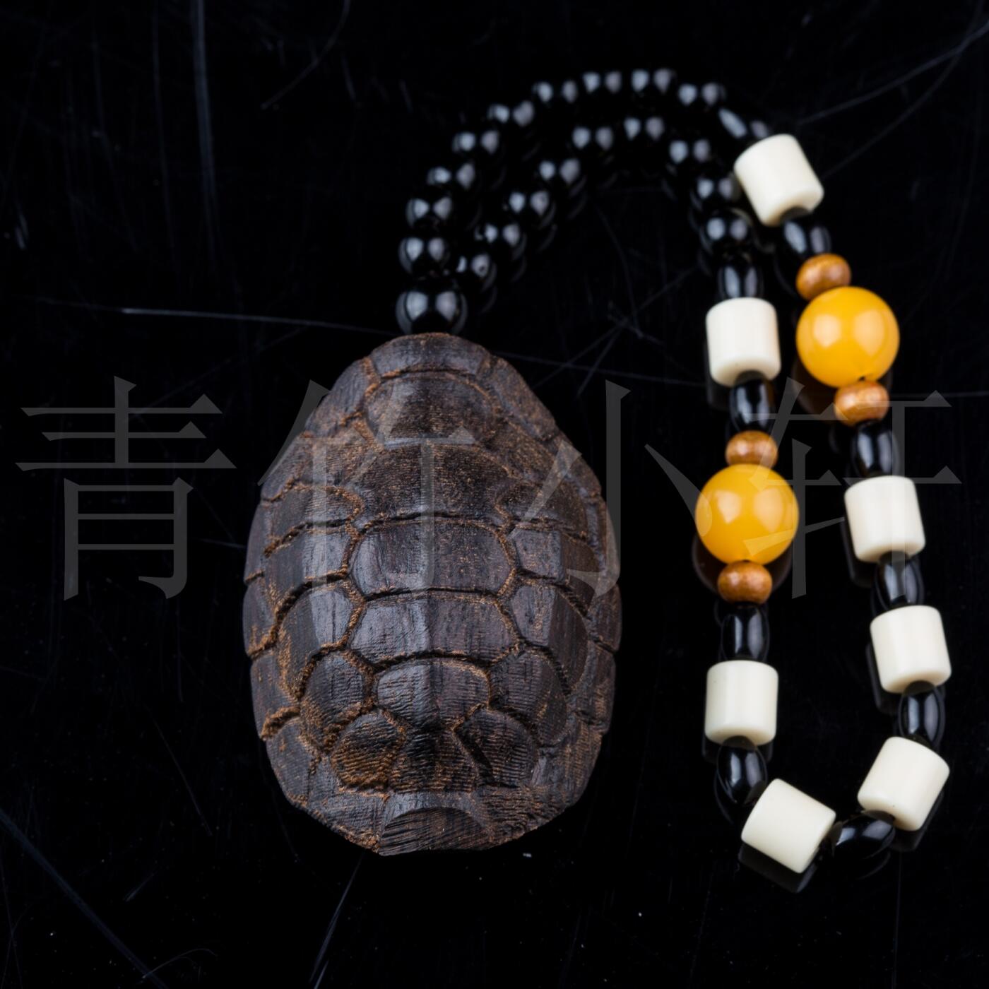 富甲天下·沉香木龟甲手把件