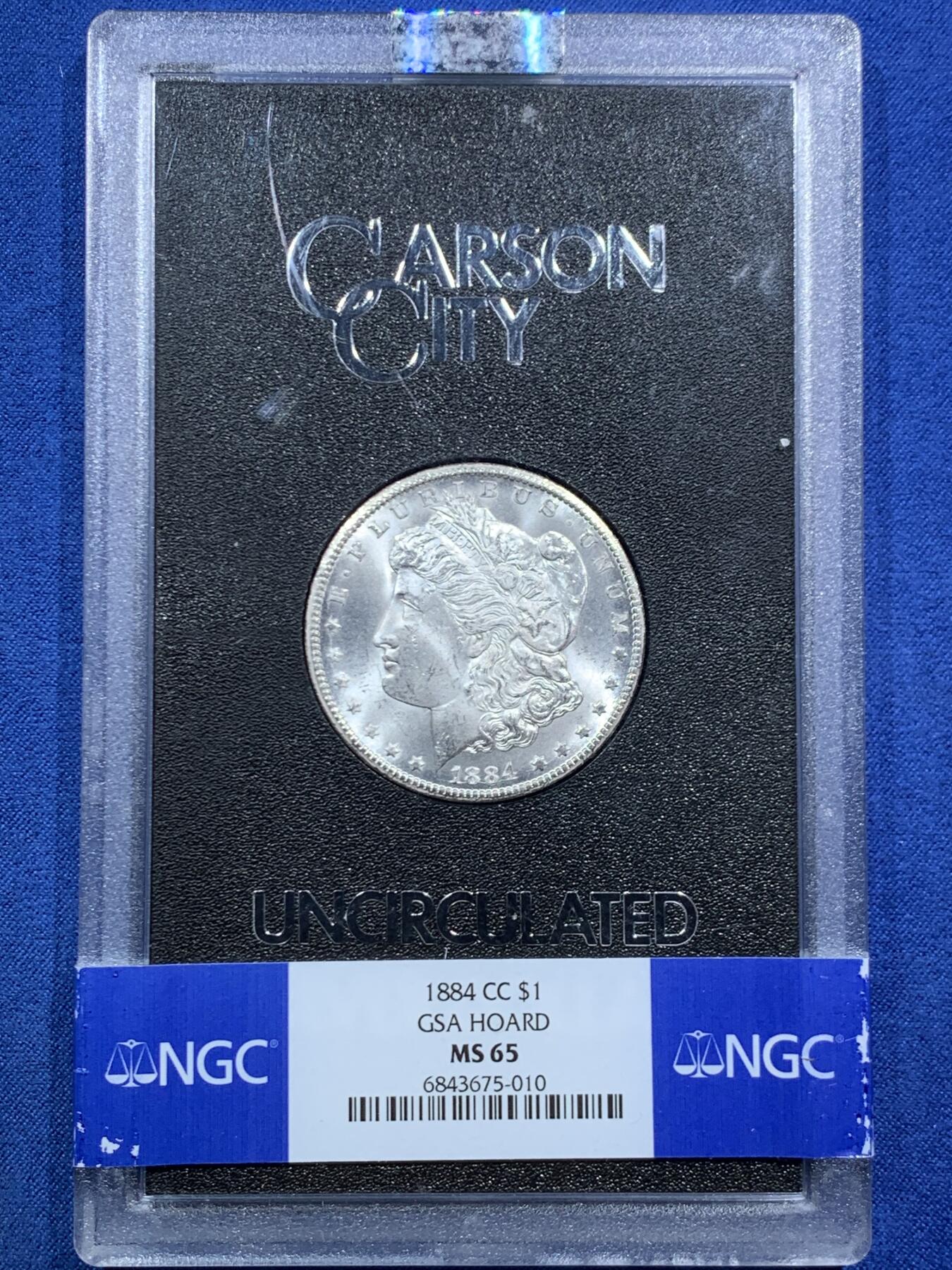 《竞宝斋》第466场 周日，周一 2场连拍 （全场包邮）欢迎送拍 NGC MS65 美国 1884 CC 摩根 GSA 稀有卡森厂 绝版大封装 十字转光 品相极佳 上65分难得