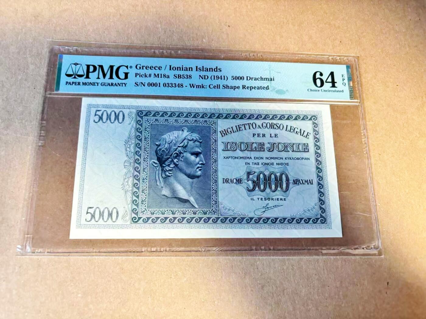 【Blue Auction】世界纸币精拍第789期——18级TOP拍卖/信誉/品质/专业/高效💫  【0001首发冠 该套最高值】希腊 伊奥尼亚群岛大区 1941年5000德拉科马 PMG64EPQ 全新原票 正面为欧洲“四大战神”之一的凯撒大帝 其奠定了罗马帝国根基 背面为一系列多组神话人物及场景 非常有特色 不容错过