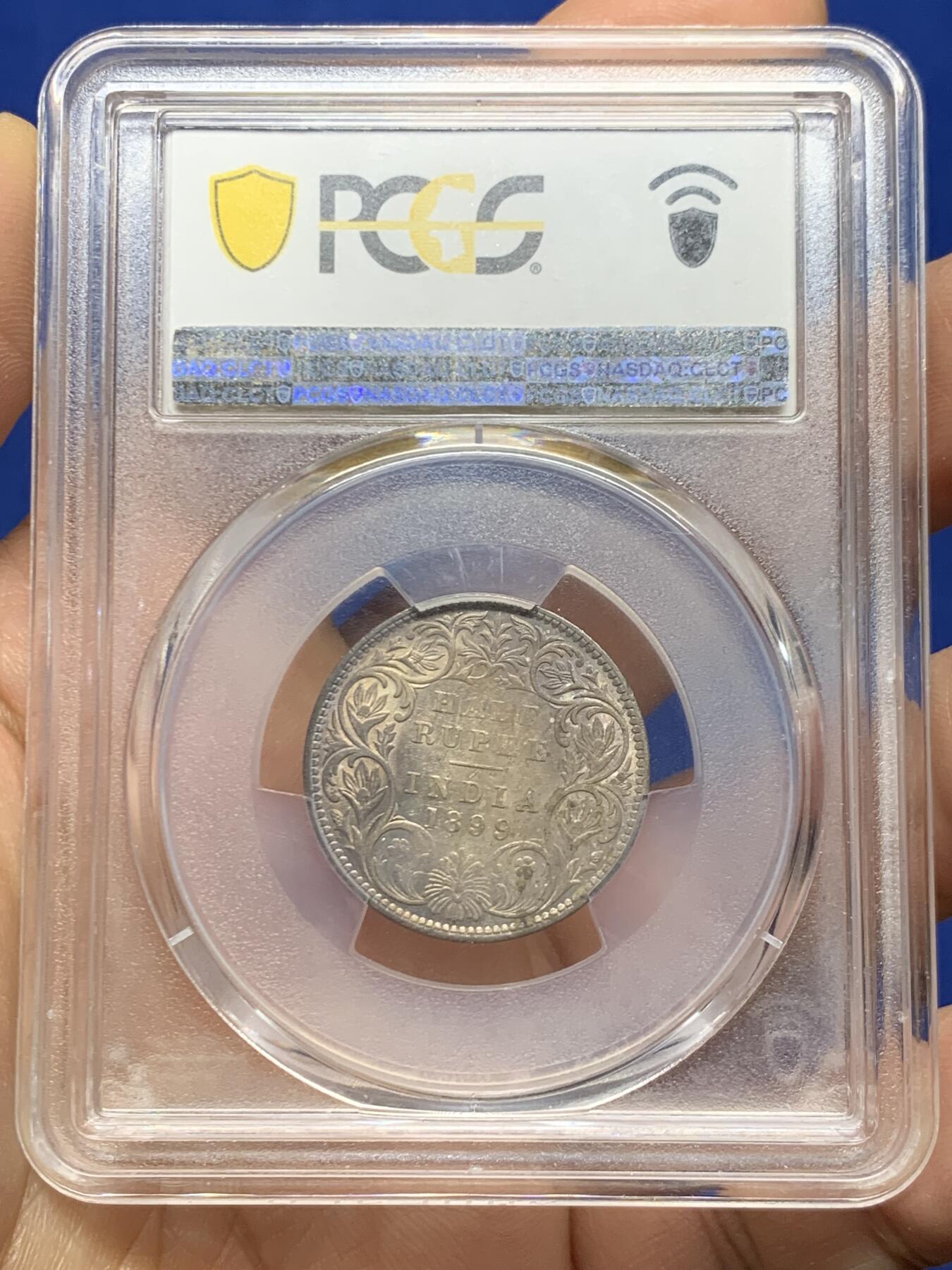 《竞宝斋》第466场 周日，周一 2场连拍 （全场包邮）欢迎送拍 PCGS AU53 英属印度1899-B半卢比，酱彩包浆，较少见。