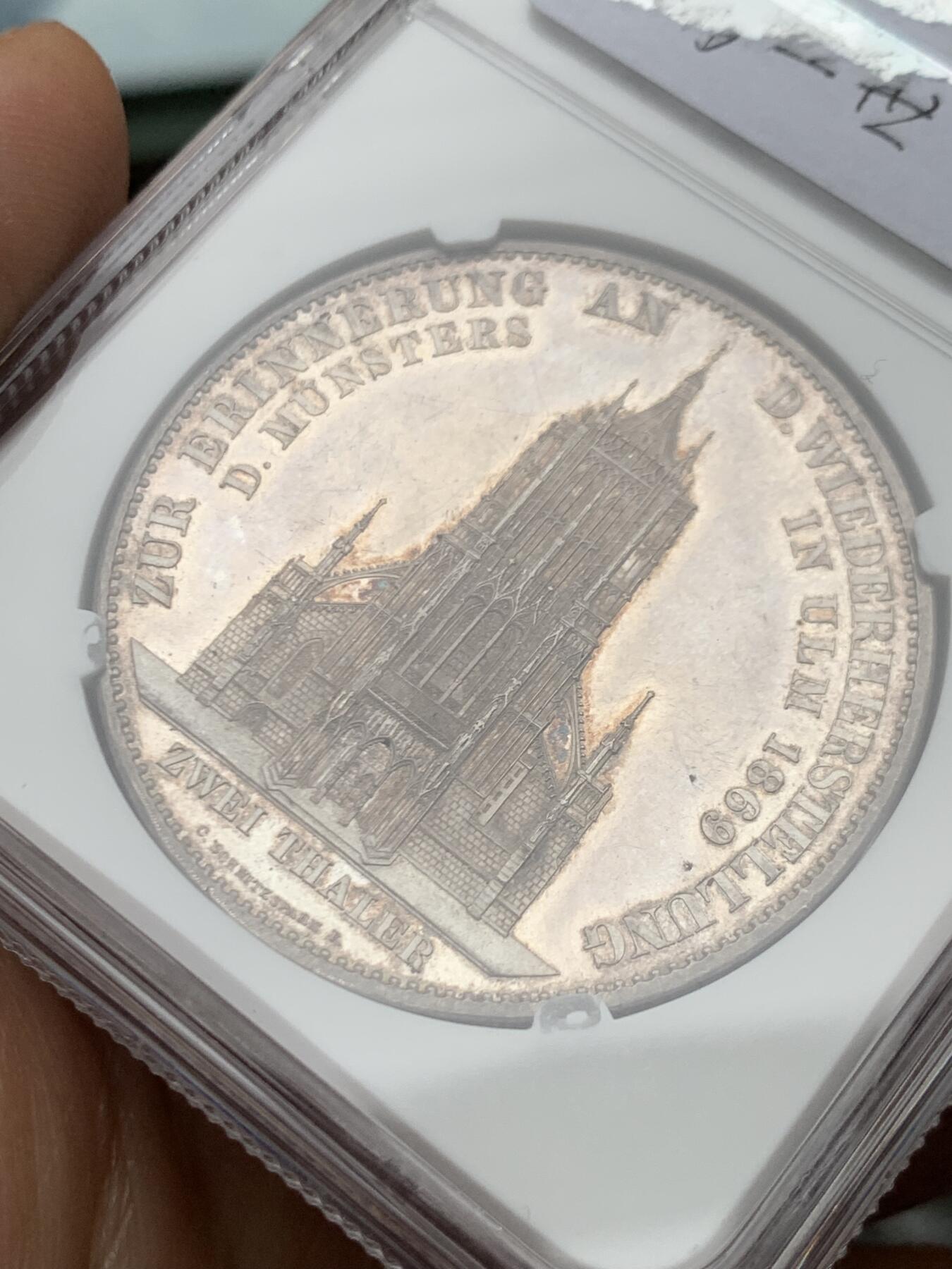 《竞宝斋》第466场 周日，周一 2场连拍 （全场包邮）欢迎送拍 NGC PF62 德国 精制符腾堡王国1869年乌尔姆大教堂2泰勒银币，正面帶五彩包浆，1869年比1871年的少,僅發行1776枚