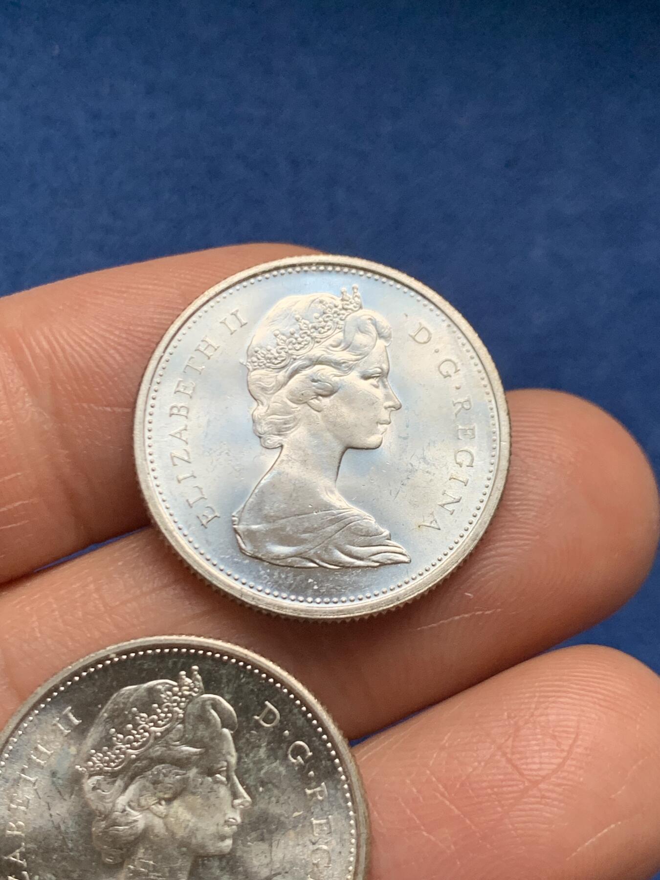 《竞宝斋》第466场 周日，周一 2场连拍 （全场包邮）欢迎送拍 两枚一组 加拿大1967年建国百年纪念25分银币 正面伊丽莎白二世女王 背面猞猁 总重11.9克