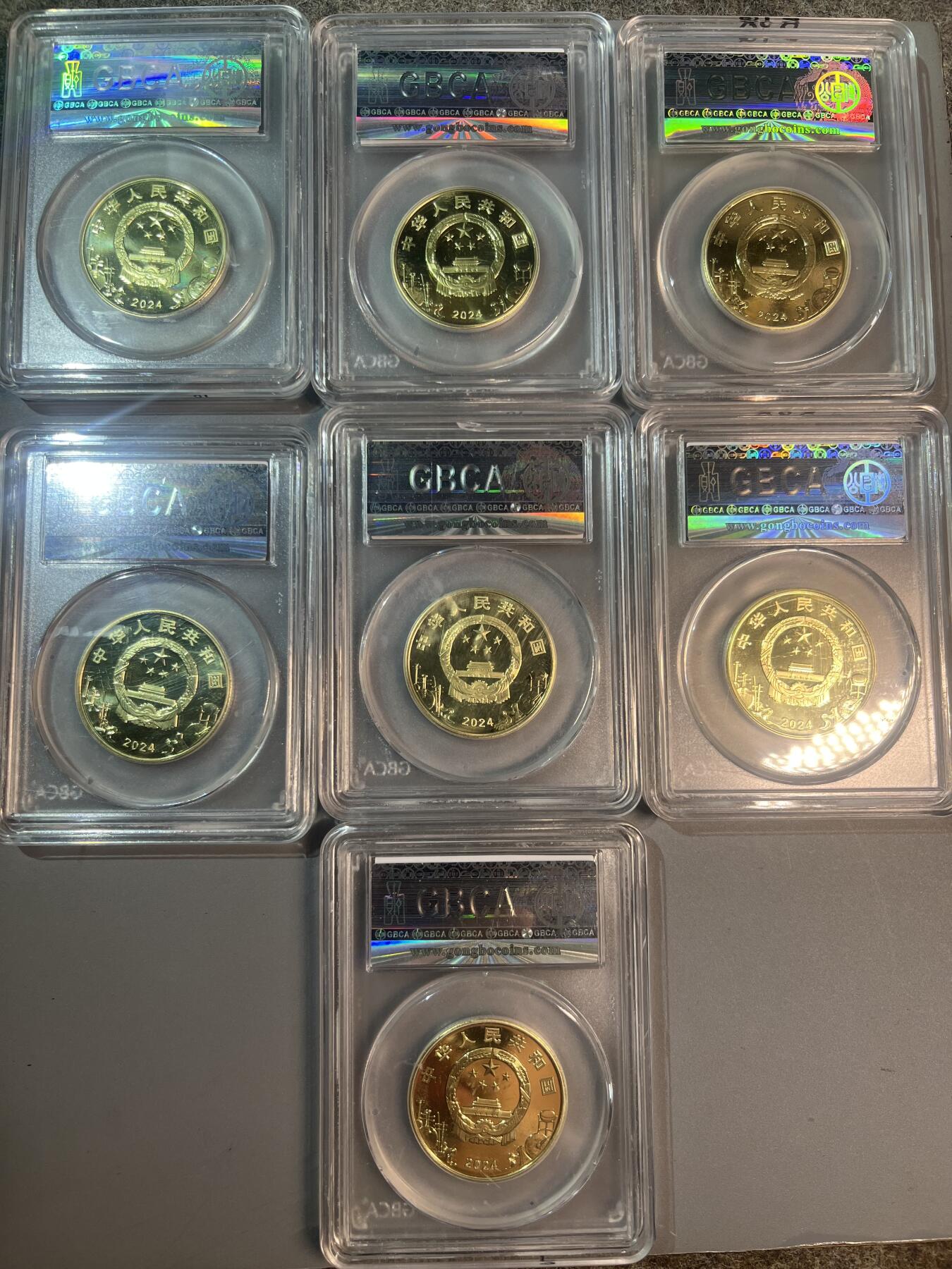 公博评级京旦纪念币7枚，请看好实拍图片及对比官网以及以及描述，我们小店评级币售出不退不换的，确定请知悉