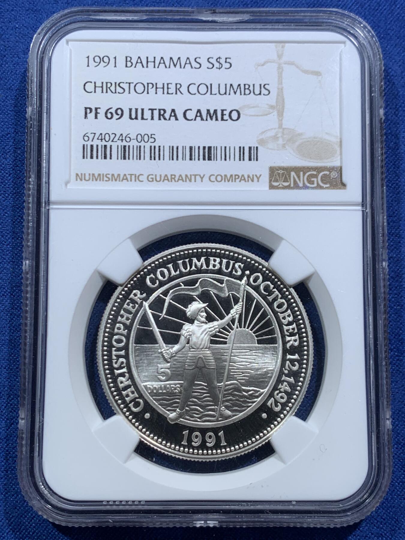 《竞宝斋》第467场 周日，周一 2场连拍 （全场包邮）欢迎送拍 NGC PF69UC 巴哈马1991年哥伦布发现美洲500周年5元精制纪念银币，镜面超高浮雕，19.44克，925银，精制银币作为赠品，收藏价值高。