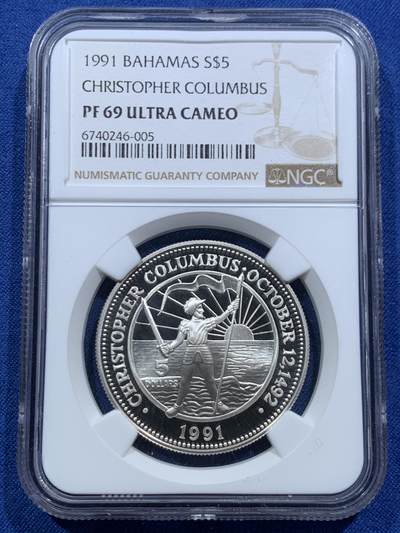 《竞宝斋》第467场 周日，周一 2场连拍 （全场包邮）欢迎送拍 - NGC PF69UC 巴哈马1991年哥伦布发现美洲500周年5元精制纪念银币，镜面超高浮雕，19.44克，925银，精制银币作为赠品，收藏价值高。