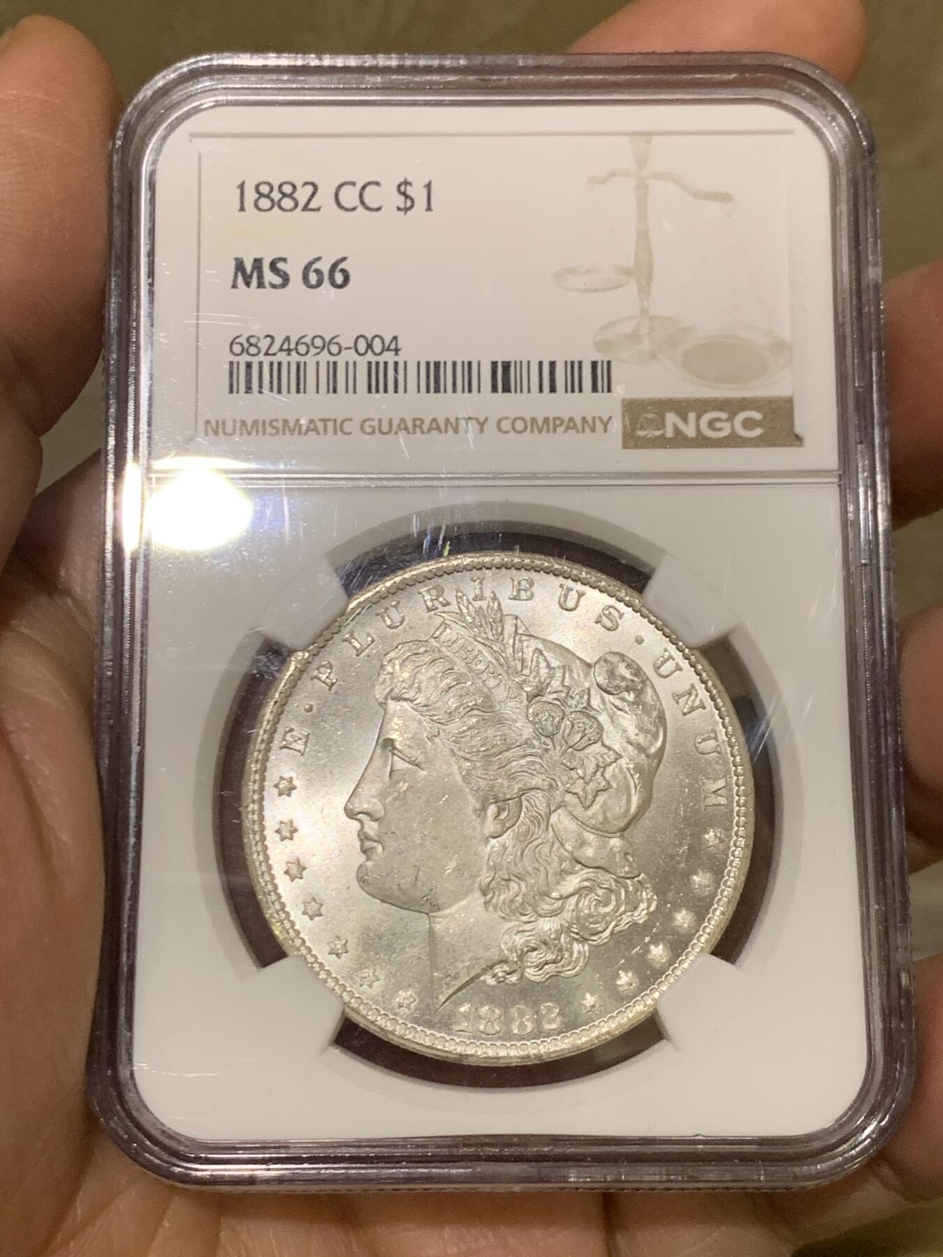 《竞宝斋》第467场 周日，周一 2场连拍 （全场包邮）欢迎送拍 NGC MS66 美国 1882 CC 摩根 稀有卡森厂 麦稀奇所见最高分 转光犀利 打制极美 银霜感十足 不可错过的极佳收藏品 一枚毕业