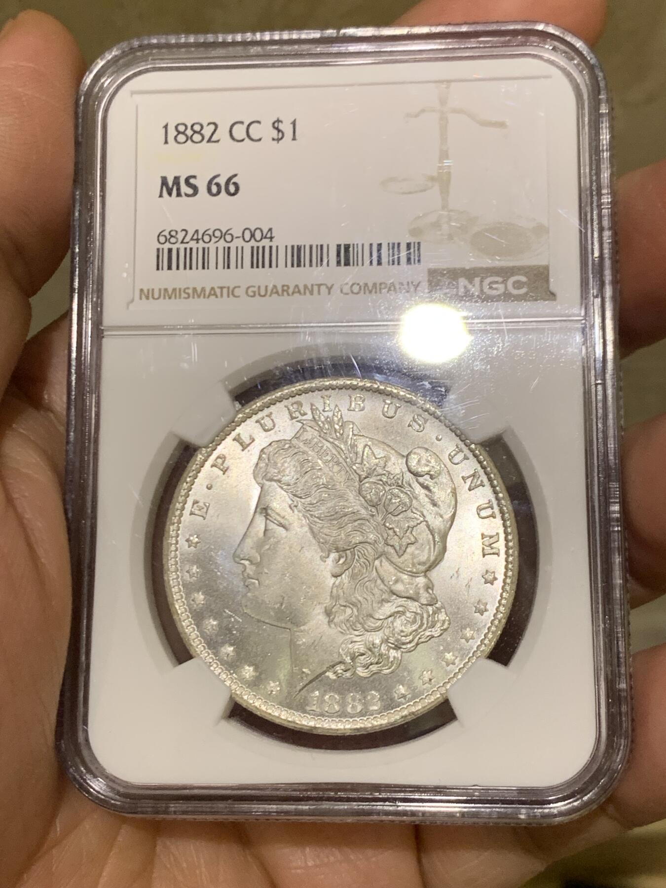 《竞宝斋》第467场 周日，周一 2场连拍 （全场包邮）欢迎送拍 NGC MS66 美国 1882 CC 摩根 稀有卡森厂 麦稀奇所见最高分 转光犀利 打制极美 银霜感十足 不可错过的极佳收藏品 一枚毕业