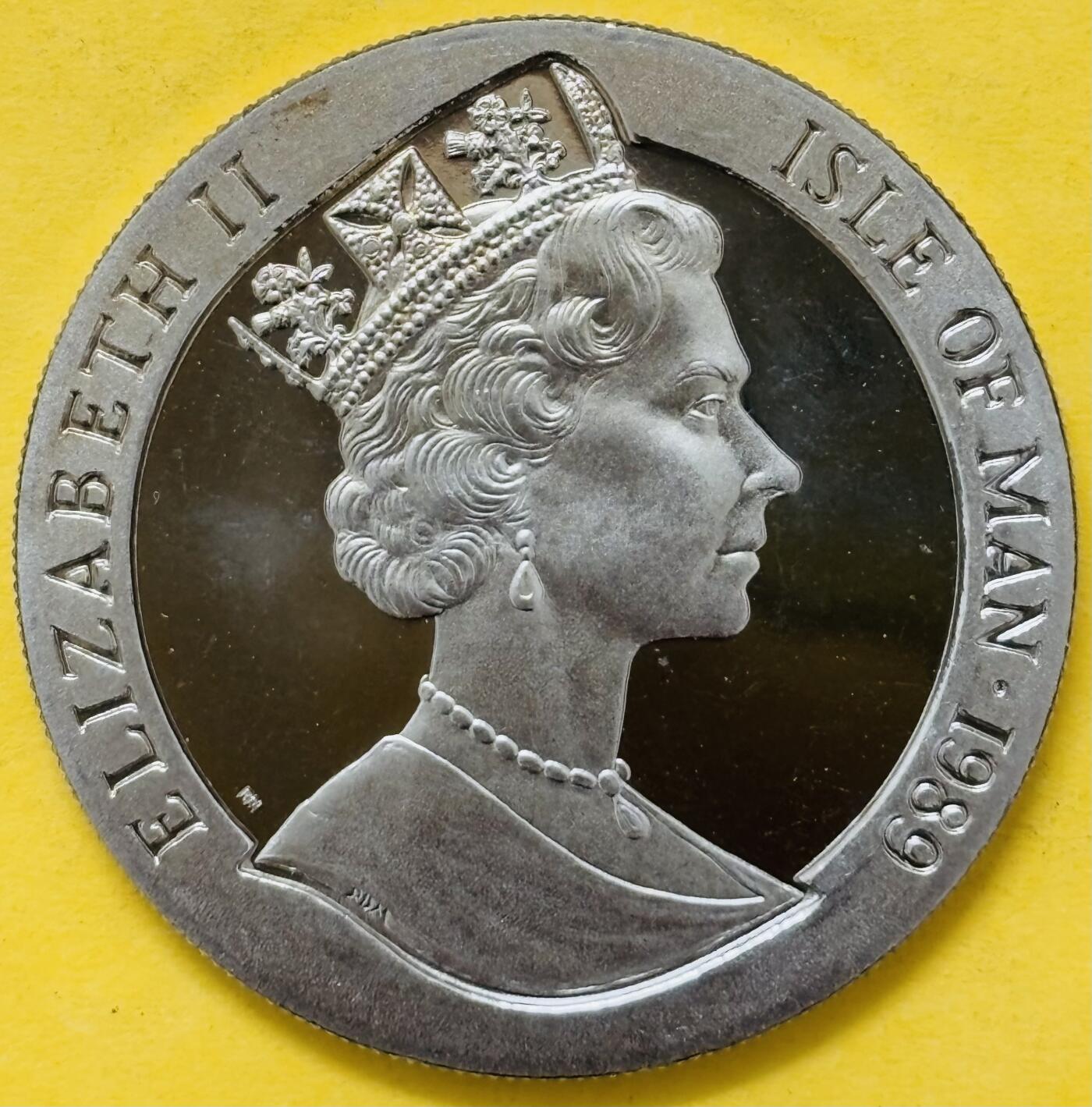 文馨钱币收藏第 295 场，（元宵场）各种银币散币纪念章，长期接代拍业务 全新 1989 年马恩岛 1 克朗精制纪念币，皇家访问