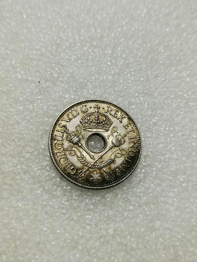 天下钱庄专场欢迎参拍 - 新几内亚中孔银币