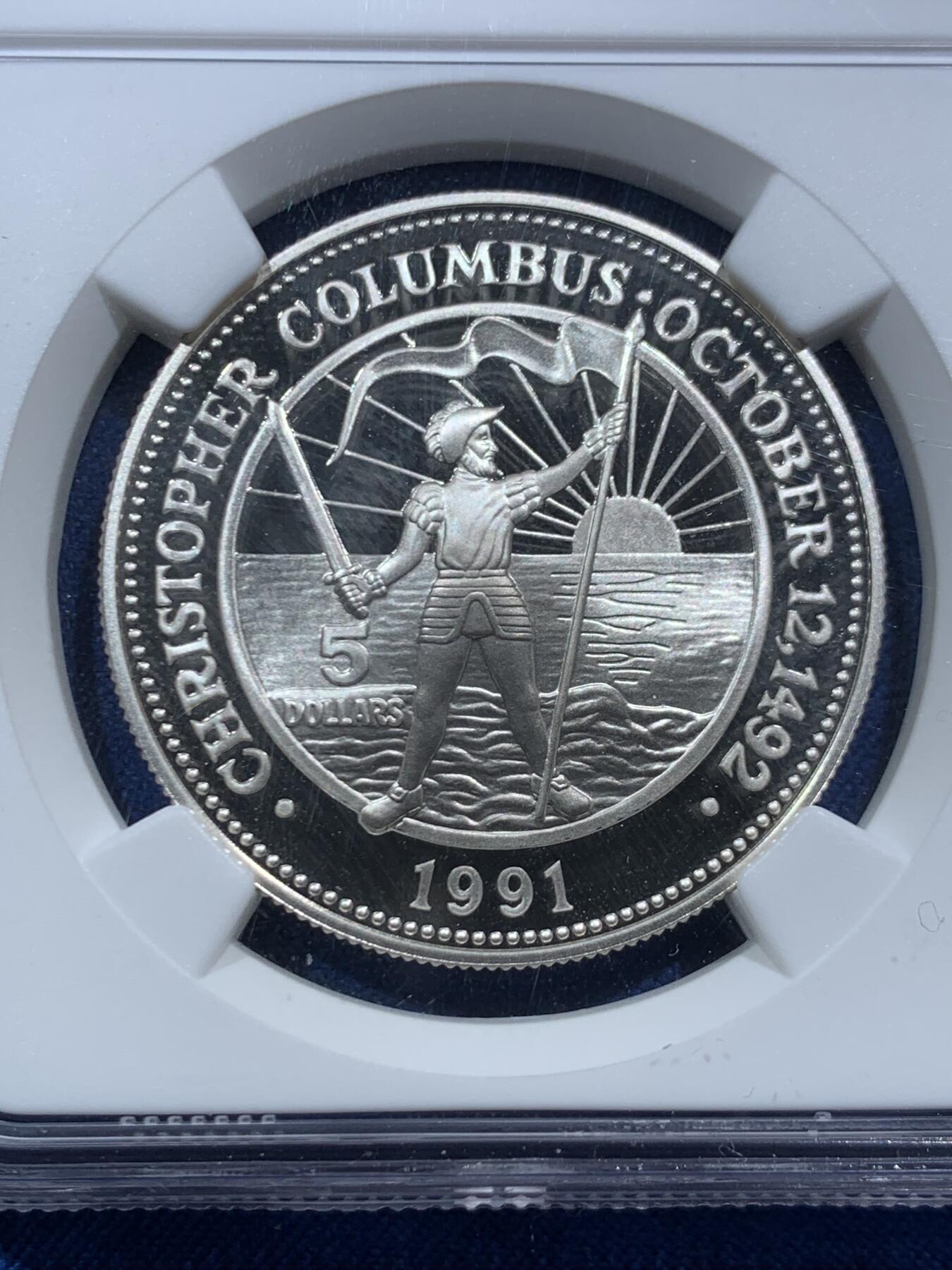 《竞宝斋》第467场 周日，周一 2场连拍 （全场包邮）欢迎送拍 NGC PF69UC 巴哈马1991年哥伦布发现美洲500周年5元精制纪念银币，镜面超高浮雕，19.44克，925银，精制银币作为赠品，收藏价值高。