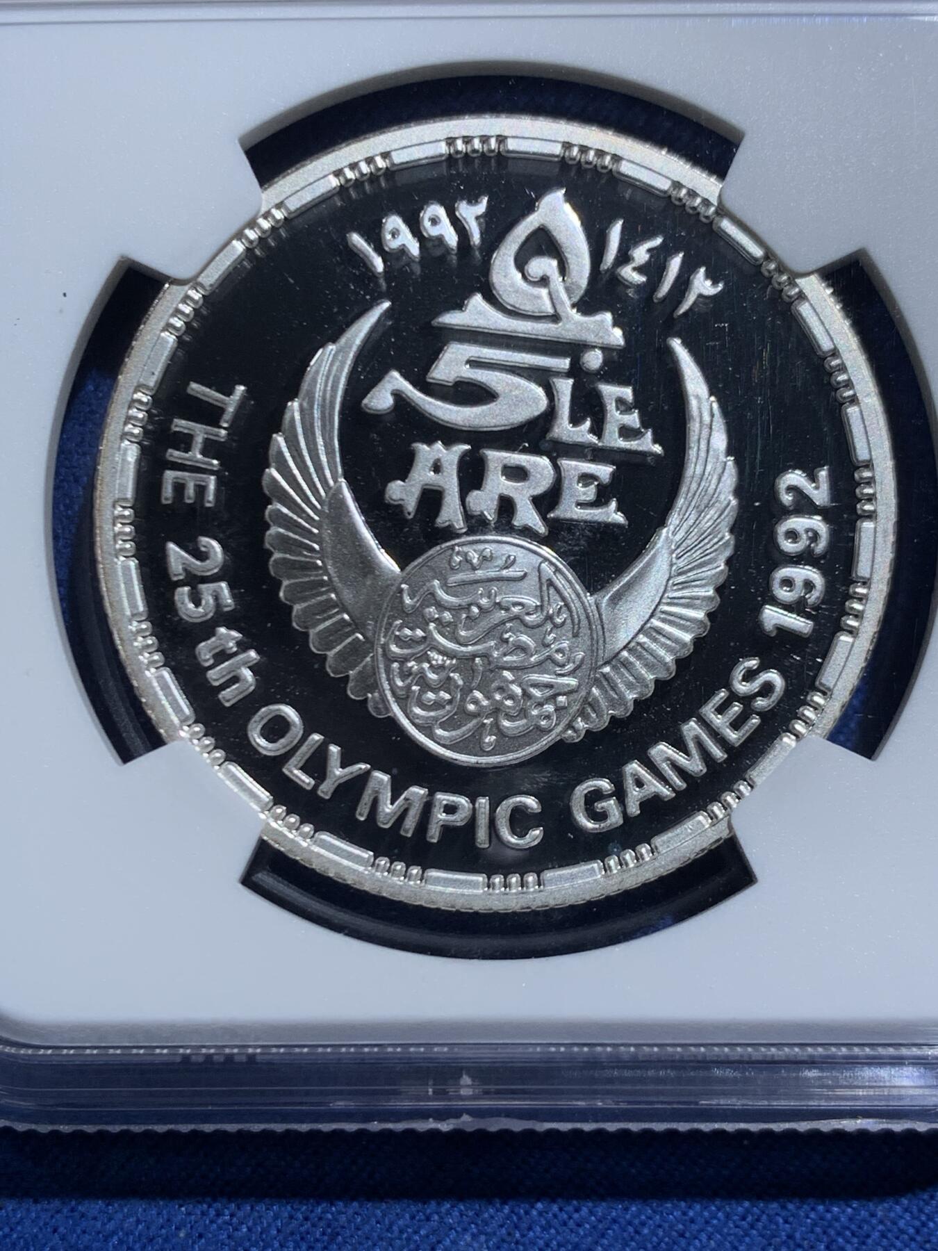 《竞宝斋》第467场 周日，周一 2场连拍 （全场包邮）欢迎送拍 NGC PF68UC 埃及1992年奥运会纪念曲棍球5镑精制银币