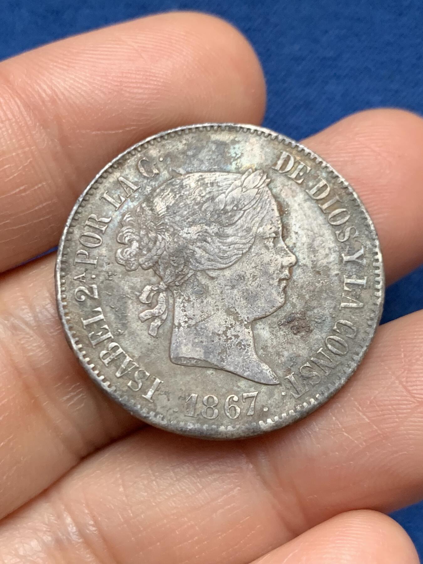 《竞宝斋》第467场 周日，周一 2场连拍 （全场包邮）欢迎送拍 少见品种 西班牙伊莎贝拉二世1埃斯库多银币，重12.7克，成色900银，高点保存不错，十分少见的品种，细节见图。