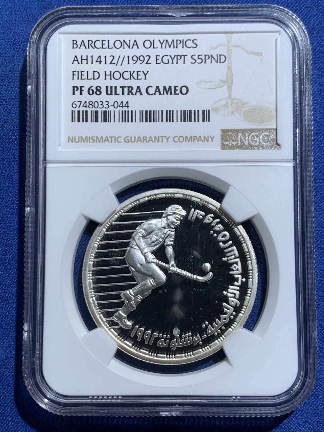 《竞宝斋》第467场 周日，周一 2场连拍 （全场包邮）欢迎送拍 NGC PF68UC 埃及1992年奥运会纪念曲棍球5镑精制银币
