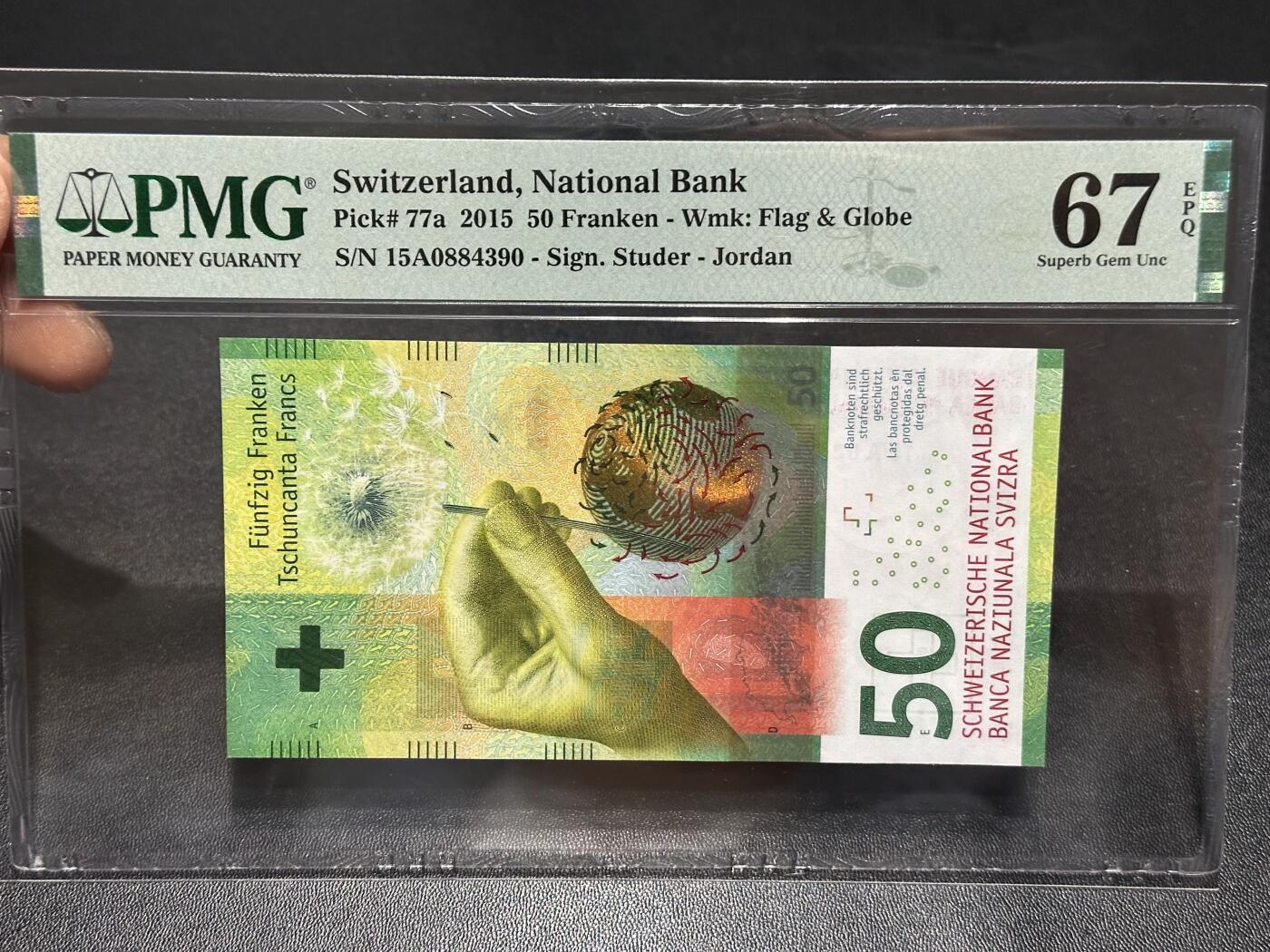 《外钞收藏家》第六百一十四期（精选场）（长期征集拍品、欢迎藏友们联系合作） 2015年瑞士手版50法郎 乔丹首签 首发A冠 PMG67