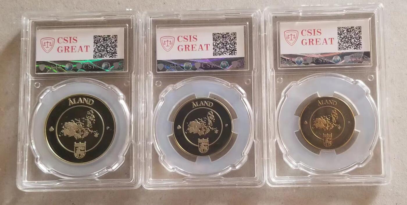 【币将精彩】世界钱币拍卖（2026-3-25） 珍稀币奥兰群岛1993年纪念币三枚   铜镍合金，信泰评级封装，有氧化。