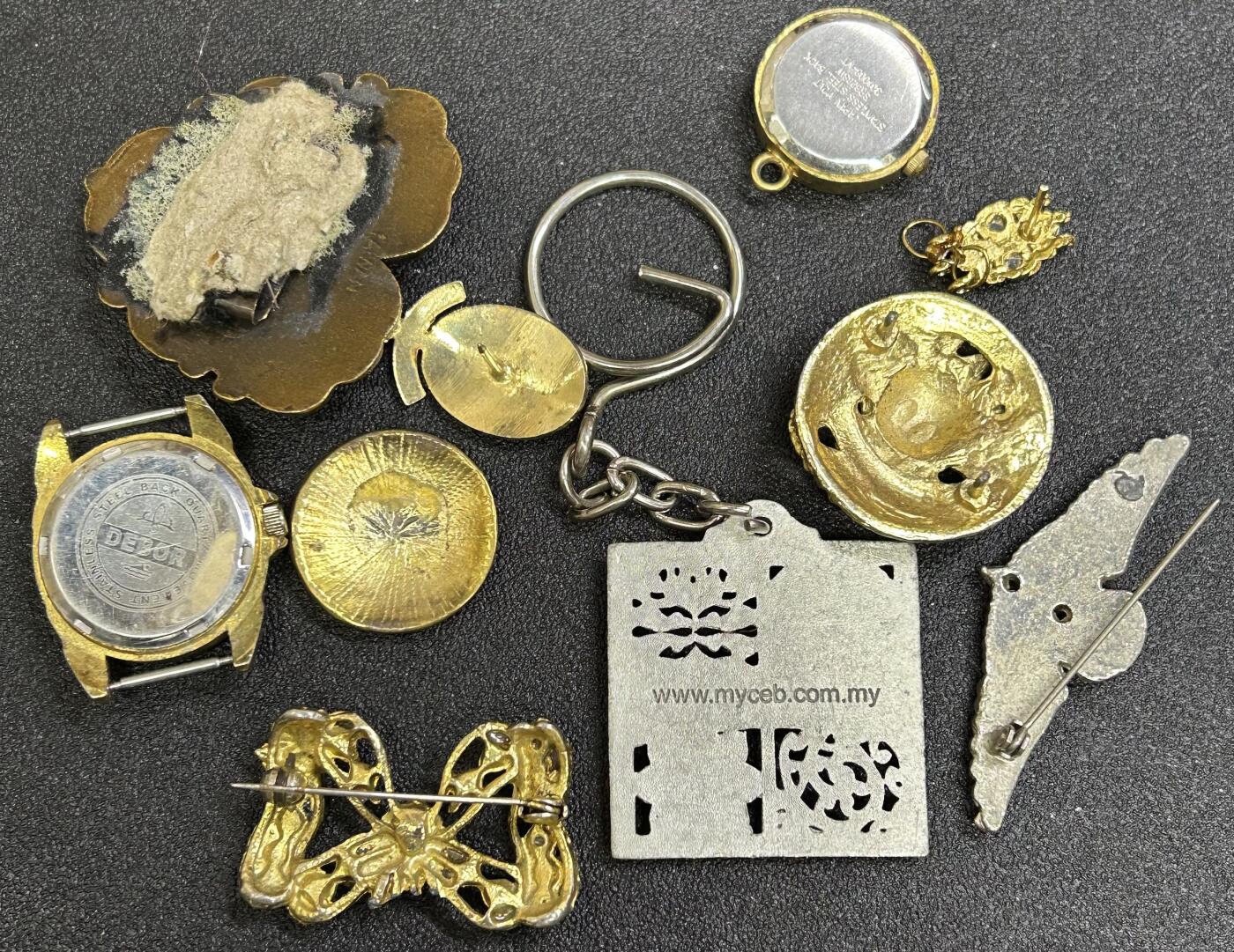 西秦中古拍卖第七十九期  泰国和马来西亚徽章，手表，回流首饰一组10件