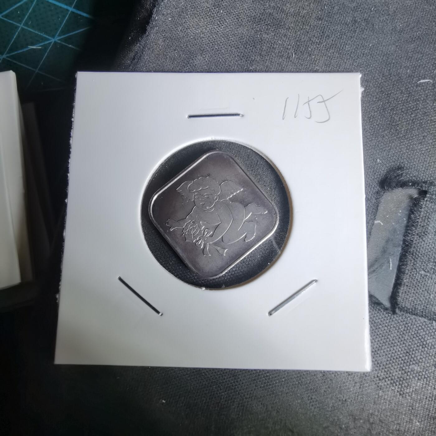 沼泽如烟--第1011场 小天使2001年4.3克纯银章