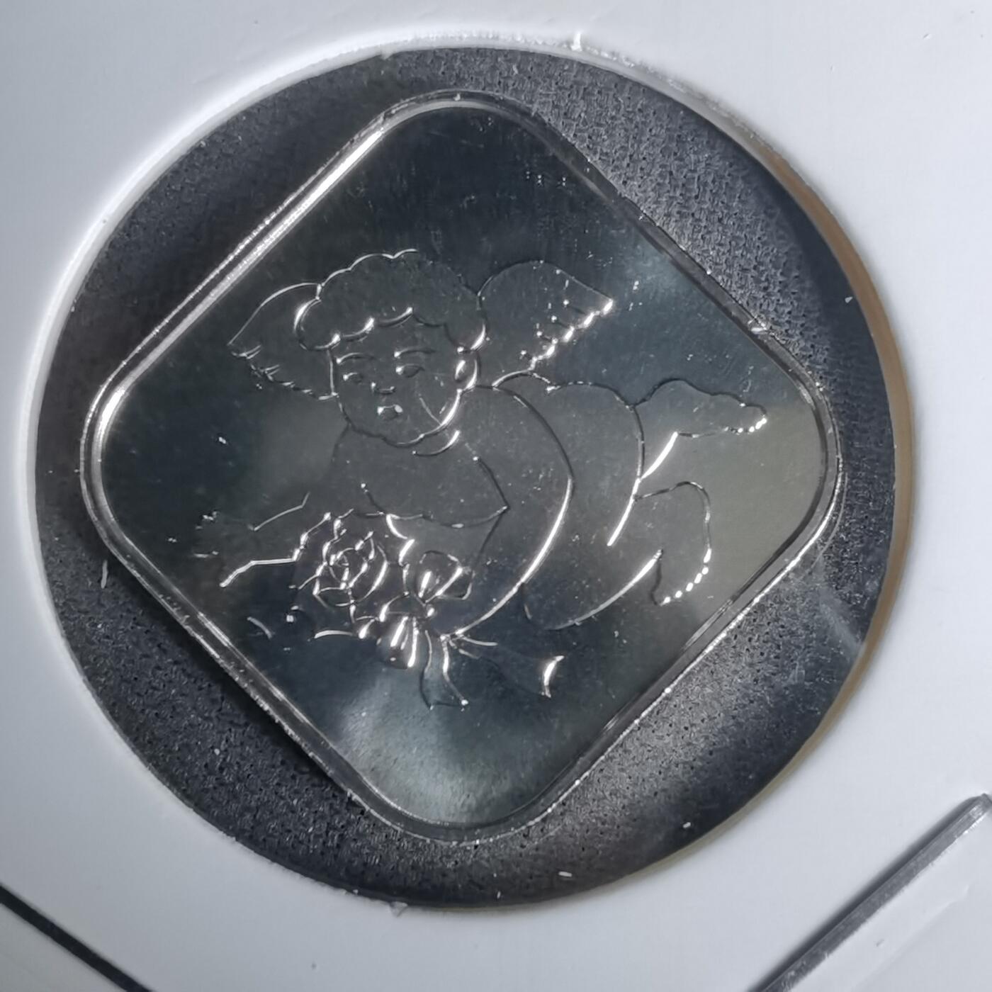 沼泽如烟--第1011场 小天使1997年纯银章4.3克