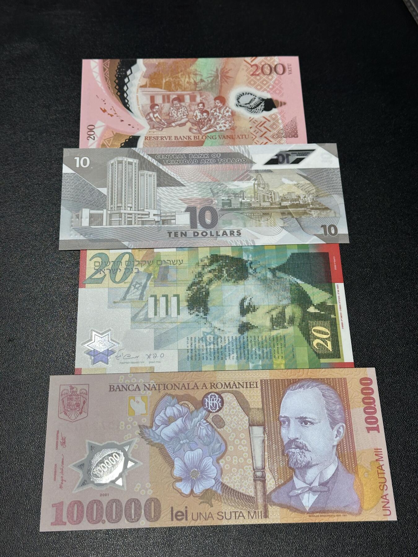 《外钞收藏家》第六百一十四期（精选场）（长期征集拍品、欢迎藏友们联系合作） 瓦努图200 AA冠豹子号666+特里达尼亚和多巴哥10 重复号660660圆圆号+以色列20无47+罗马尼亚10万A冠 四张塑料钞一起 全新UNC