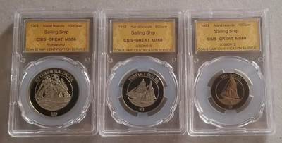 【币将精彩】世界钱币拍卖（2026-3-25） - 珍稀币奥兰群岛1993年纪念币三枚   铜镍合金，信泰评级封装，有氧化。