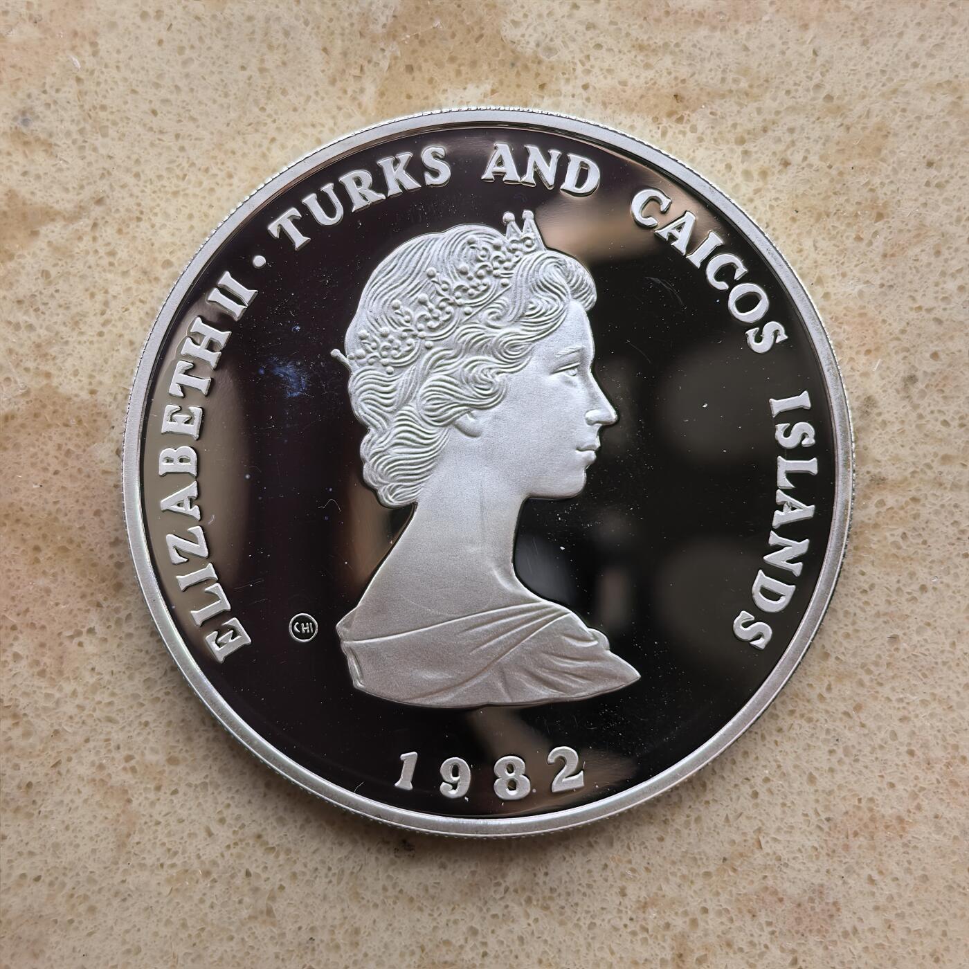 道一币馆币章第一百六十八场 特克斯和凯科斯群岛1982年国际儿童年10克朗精制银币 23.28g 925S 8000