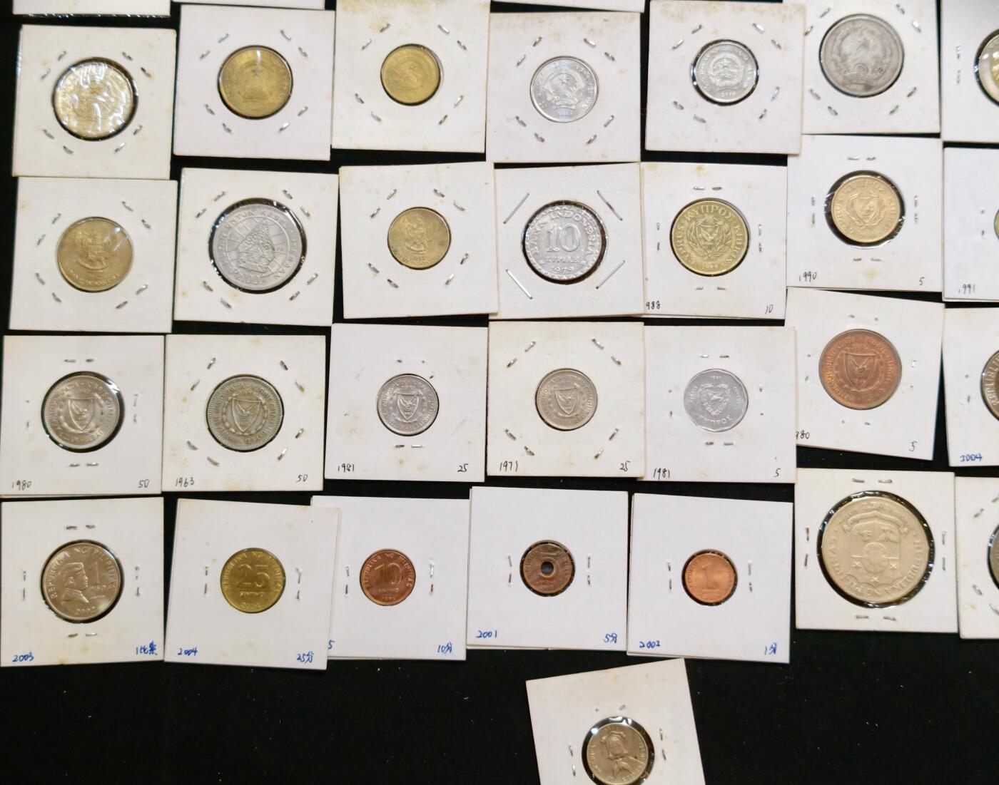 甄臻铺-世界币章拍卖（第53期），甄品场拍品征集中，送拍享返佣金等优惠多多 亚洲、大洋洲7个国家49枚硬币，印尼6枚，越南6枚，斯里兰卡4枚，新加坡5枚，菲律宾11枚，塞浦路斯10枚