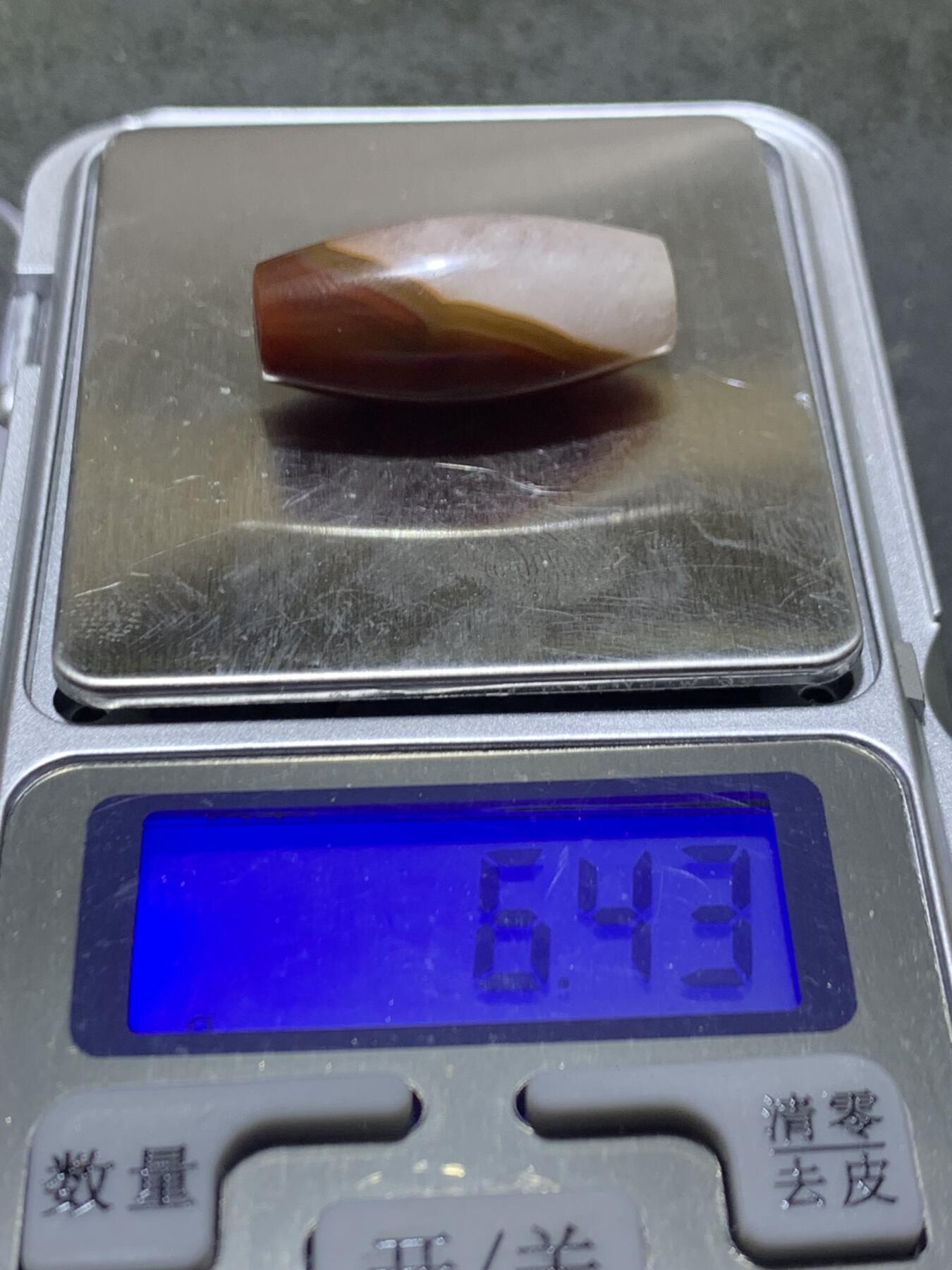 精美冰飘冻料战国红玛瑙天珠形桶珠一个，