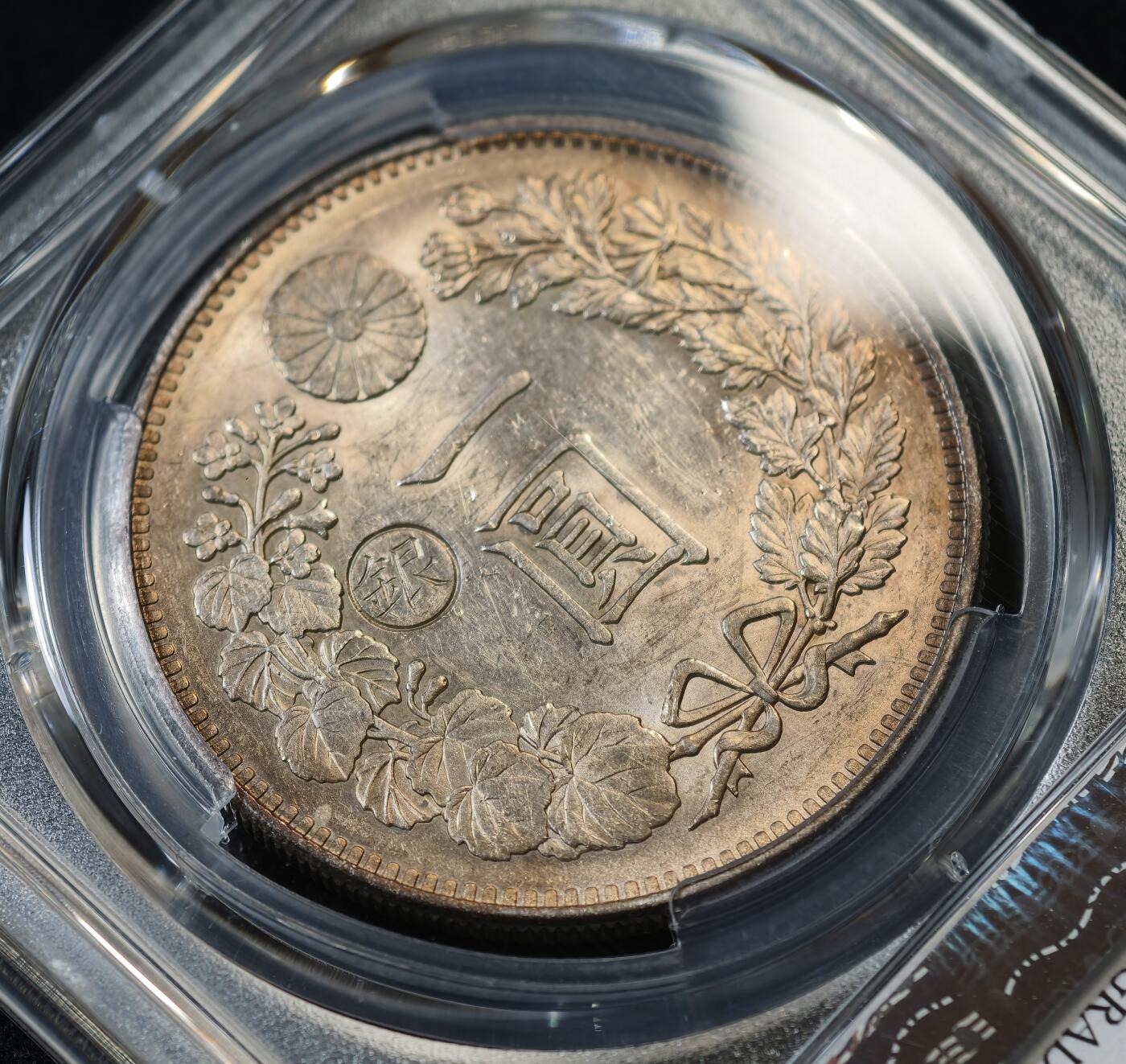 甄臻铺-世界币章拍卖（第53期），甄品场拍品征集中，送拍享返佣金等优惠多多 PCGS-UNCD 日本明治二十八年左丸银龙洋，原光淡彩包浆，再养养可以搏一搏