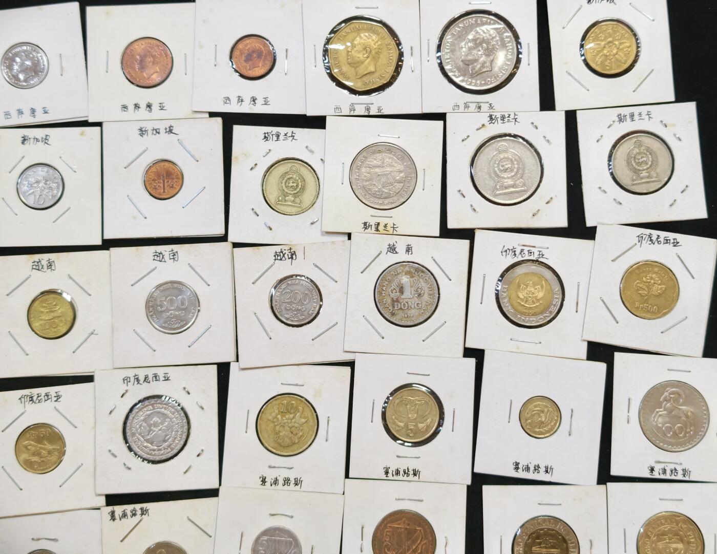 甄臻铺-世界币章拍卖（第53期），甄品场拍品征集中，送拍享返佣金等优惠多多 亚洲、大洋洲7个国家49枚硬币，印尼6枚，越南6枚，斯里兰卡4枚，新加坡5枚，菲律宾11枚，塞浦路斯10枚