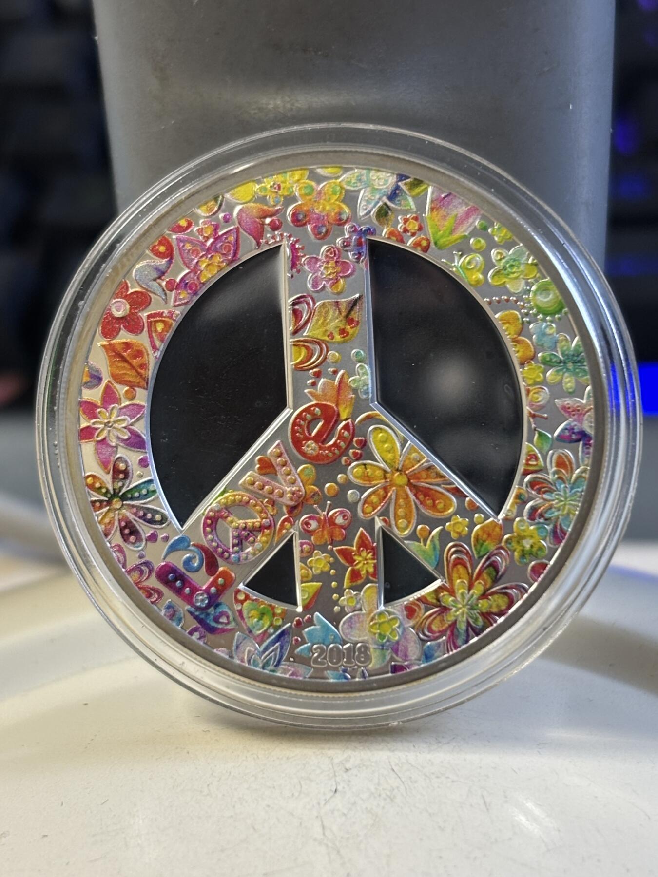 第192期拍卖 帕劳2018年嬉皮士夏之爱1盎司彩色精制纪念银币，999银，发行1968枚