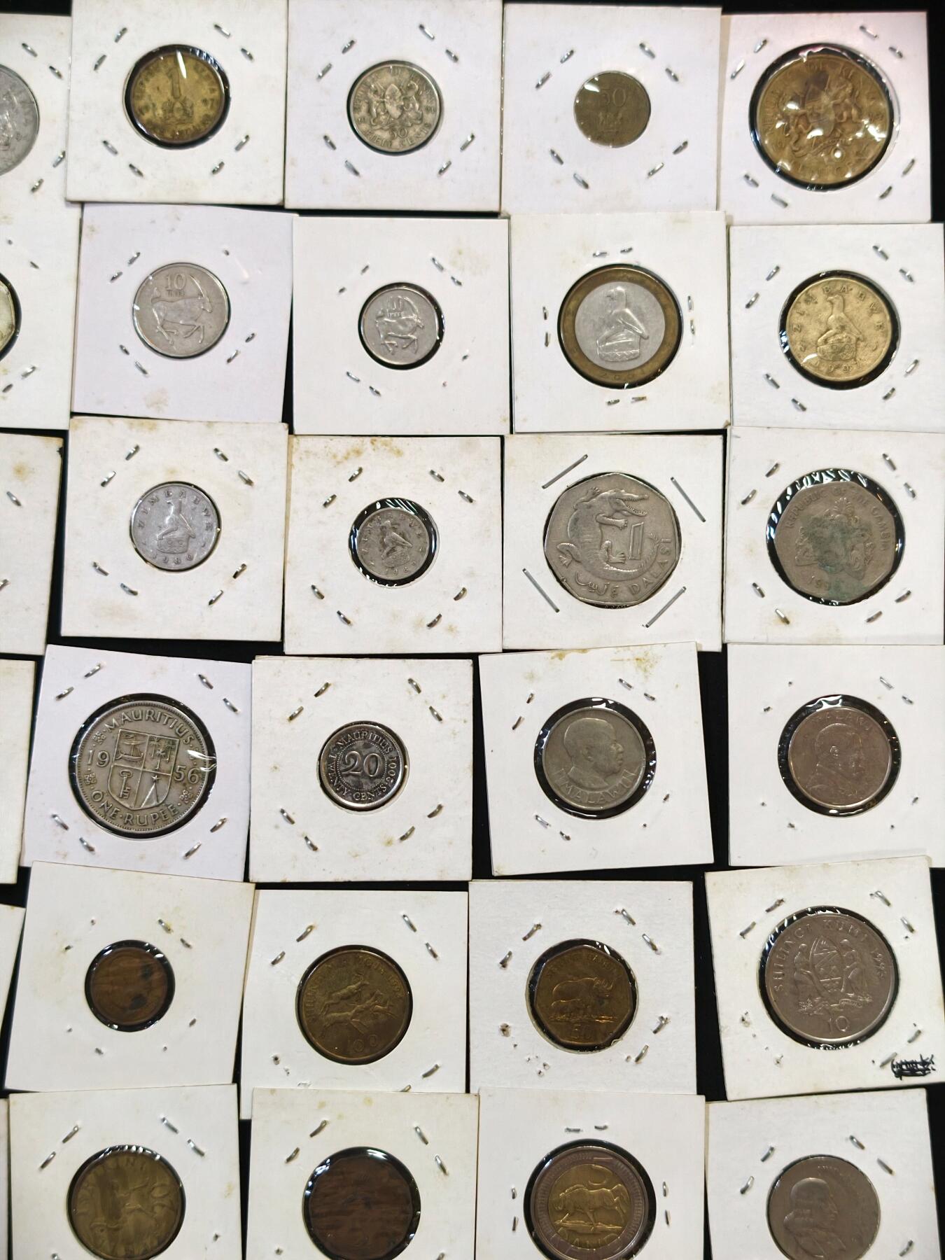 甄臻铺-世界币章拍卖（第53期），甄品场拍品征集中，送拍享返佣金等优惠多多 非洲8个国家45枚硬币，冈比亚5枚，津巴布韦7枚，博茨瓦纳3枚，肯尼亚9枚，南非7枚，坦桑尼亚8枚，马拉维6枚，毛里求斯2枚