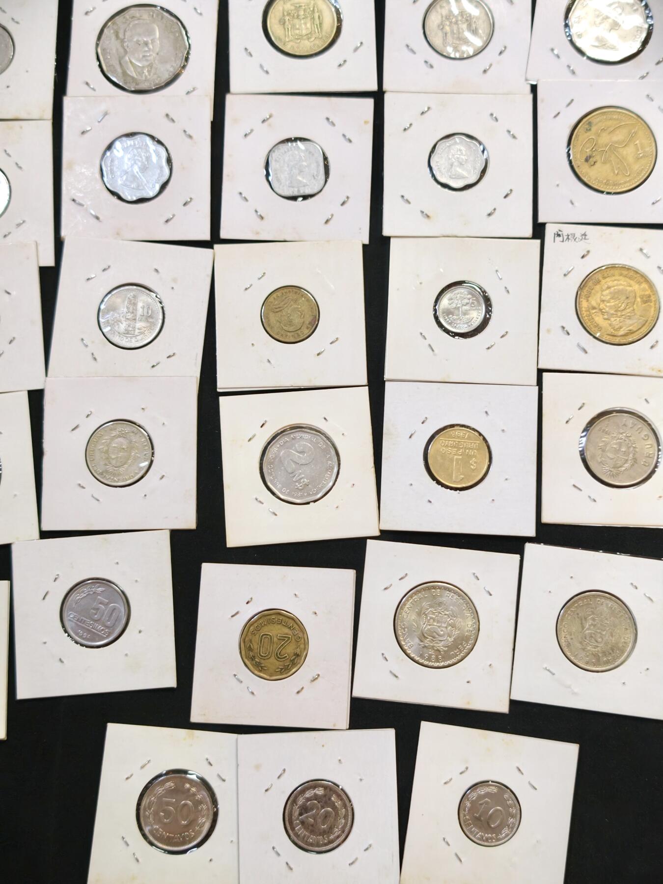 甄臻铺-世界币章拍卖（第53期），甄品场拍品征集中，送拍享返佣金等优惠多多 北美、南美8个国家45枚硬币，危地马拉5人，东加勒比群岛5枚，牙买加3枚，哥斯达黎加5枚，厄瓜多尔9枚，秘鲁9枚，乌拉圭7枚，阿根廷2枚