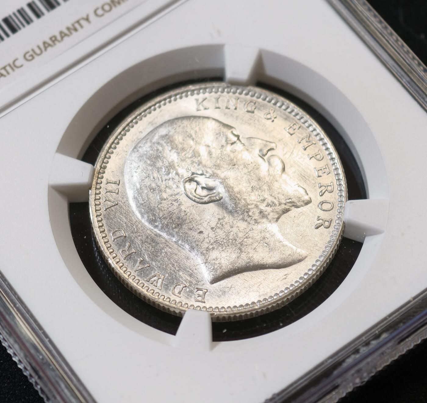 甄臻铺-世界币章拍卖（第53期），甄品场拍品征集中，送拍享返佣金等优惠多多 NGC-MS61 1907年英属印度爱德华七世卢比，MC的爱七卢比非常少见，麦稀奇几乎没有记录