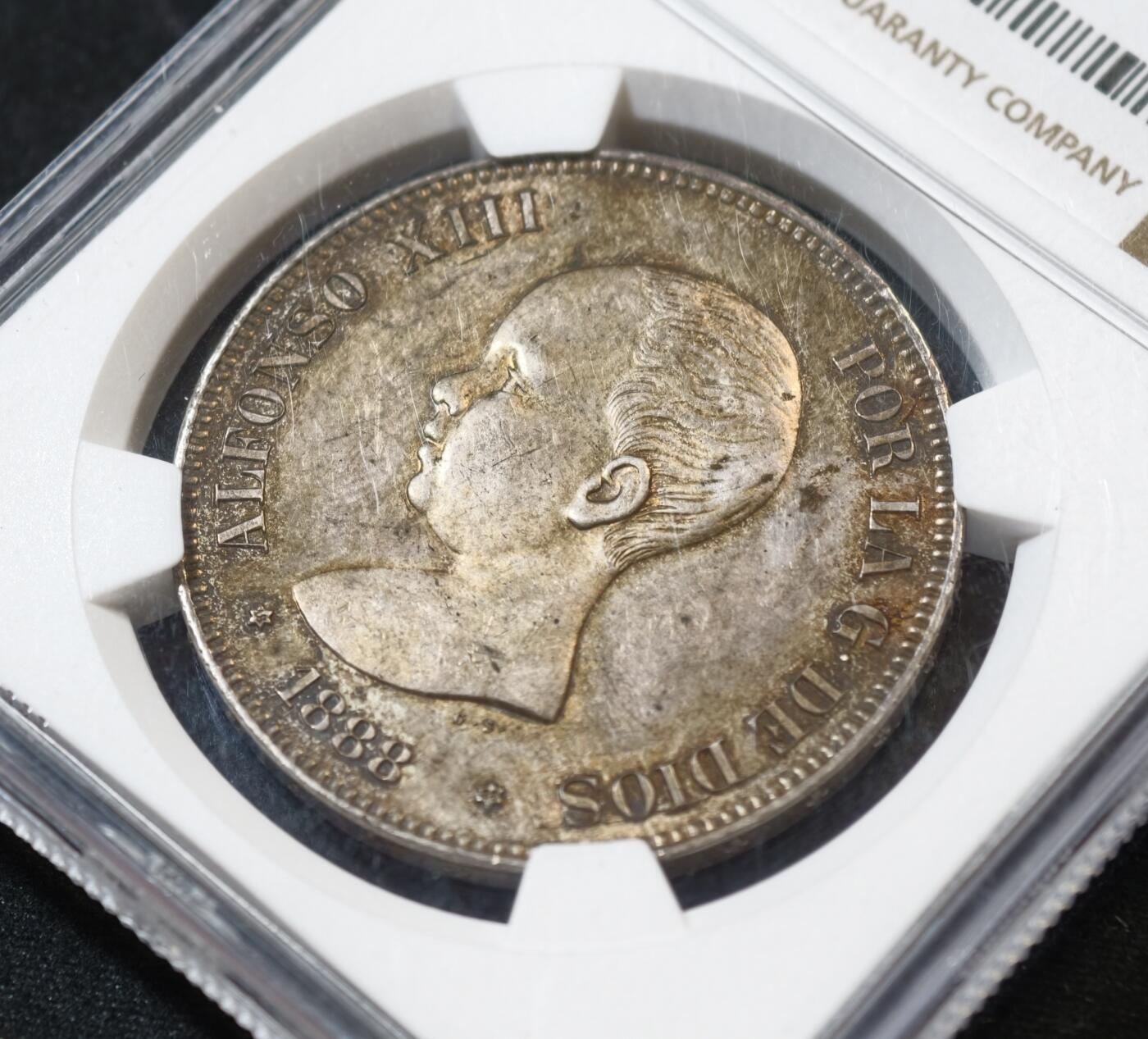 甄臻铺-世界币章拍卖（第53期），甄品场拍品征集中，送拍享返佣金等优惠多多 NGC-MS64 1888年西班牙阿方索十三世婴儿头5比塞塔银币， 该品种64分不易，值得入藏的品相