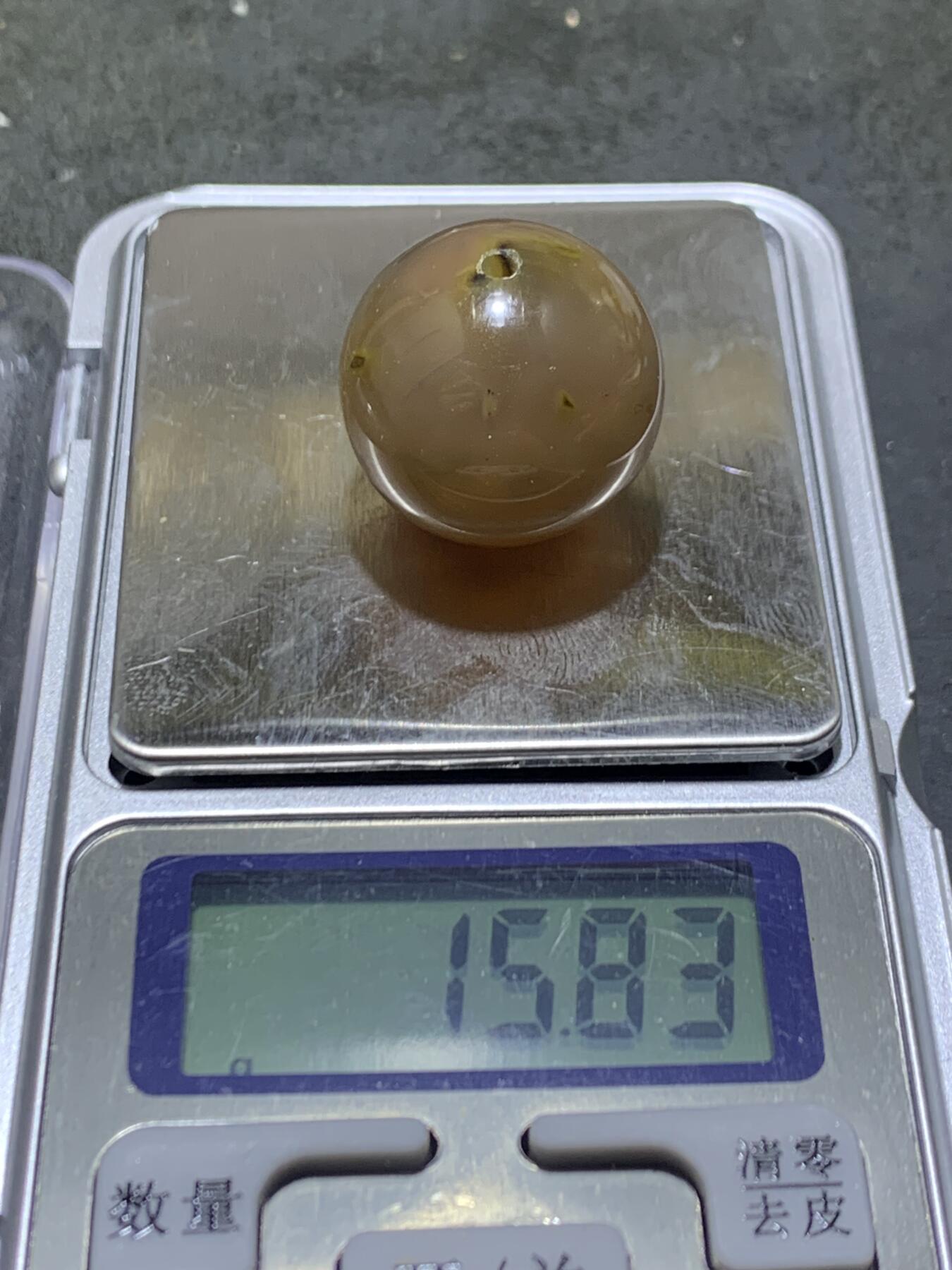 精美高润度冻料飘黄战国红玛圆珠一个，