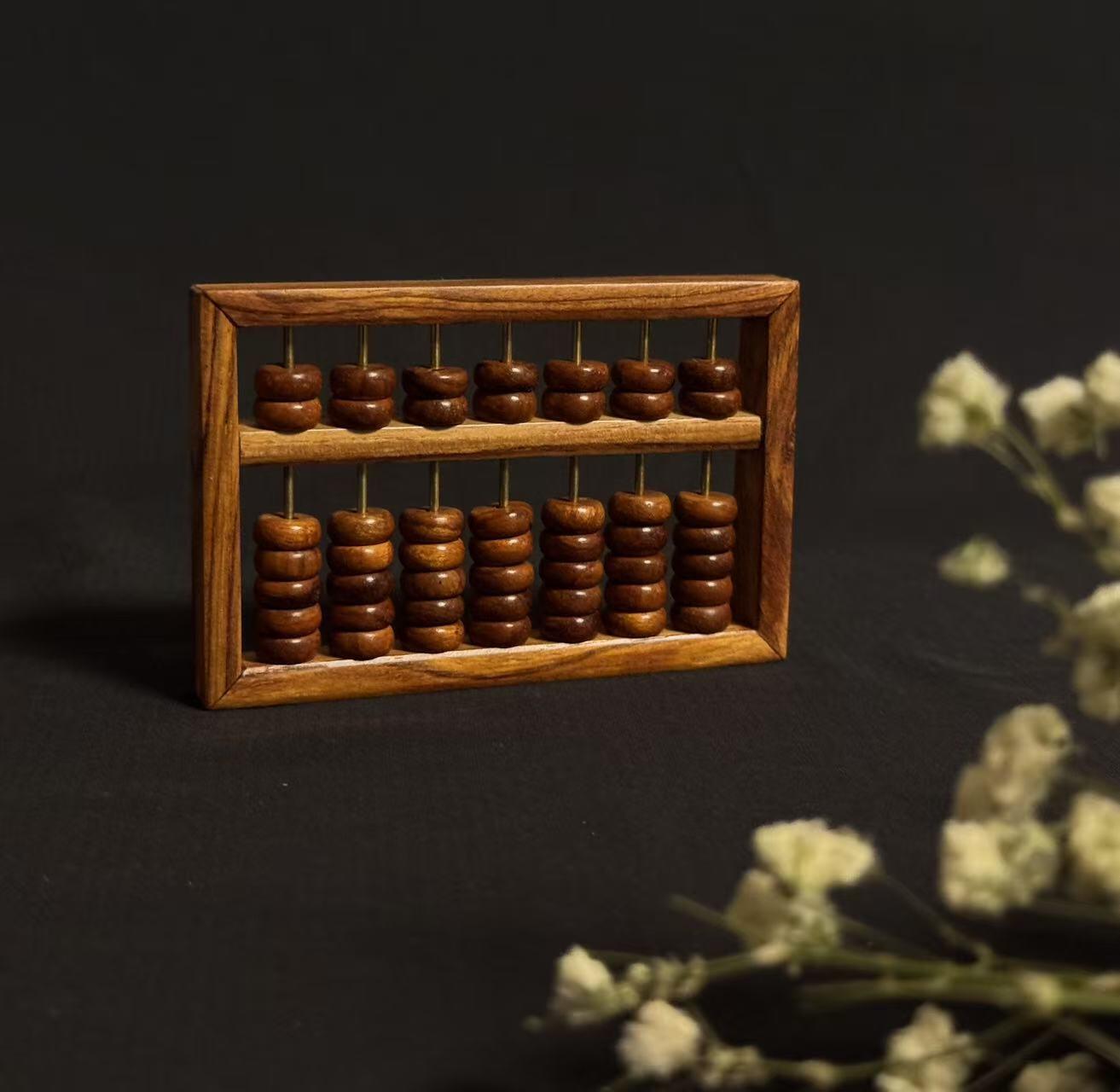 零元拍：“算盘一响，黄金万两”海南黄花梨七档小算盘。尺寸：92/60.5MM