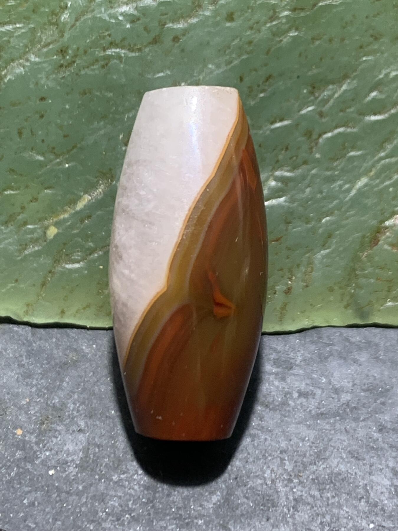 精美冰飘冻料战国红玛瑙天珠形桶珠一个，