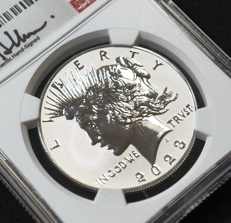 甄臻铺-世界币章拍卖（第53期），甄品场拍品征集中，送拍享返佣金等优惠多多 NGC-MS70 美国2023年反精制和平银元 首发版 带设计师签名标签 收藏首选