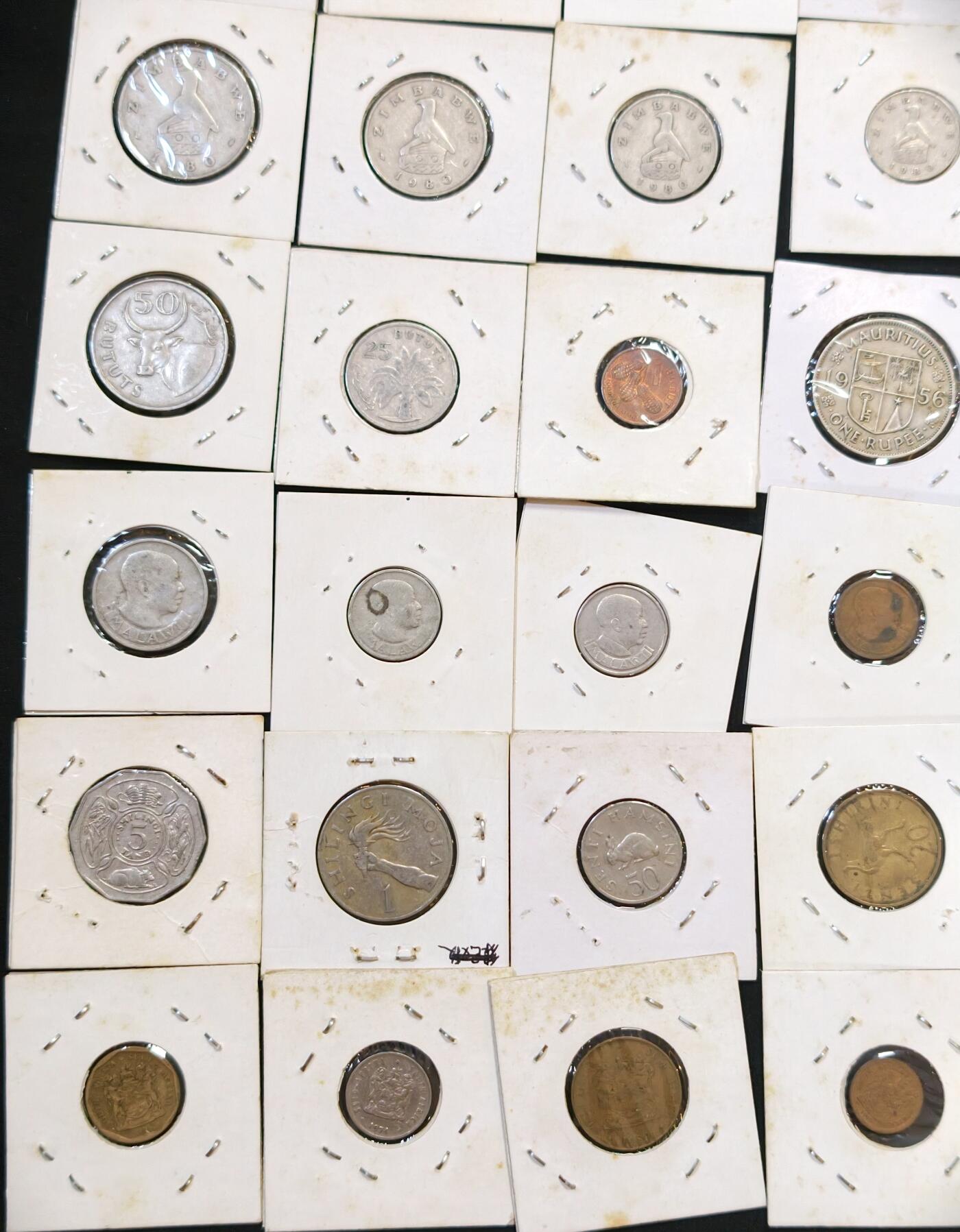 甄臻铺-世界币章拍卖（第53期），甄品场拍品征集中，送拍享返佣金等优惠多多 非洲8个国家45枚硬币，冈比亚5枚，津巴布韦7枚，博茨瓦纳3枚，肯尼亚9枚，南非7枚，坦桑尼亚8枚，马拉维6枚，毛里求斯2枚