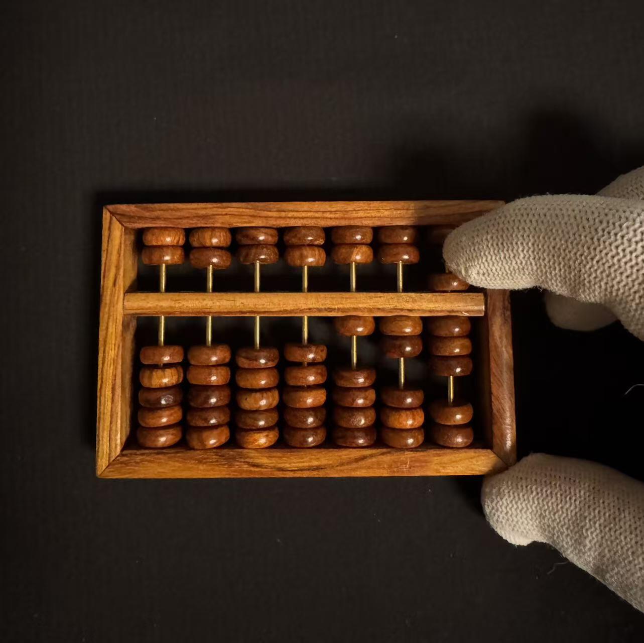 零元拍：“算盘一响，黄金万两”海南黄花梨七档小算盘。尺寸：92/60.5MM