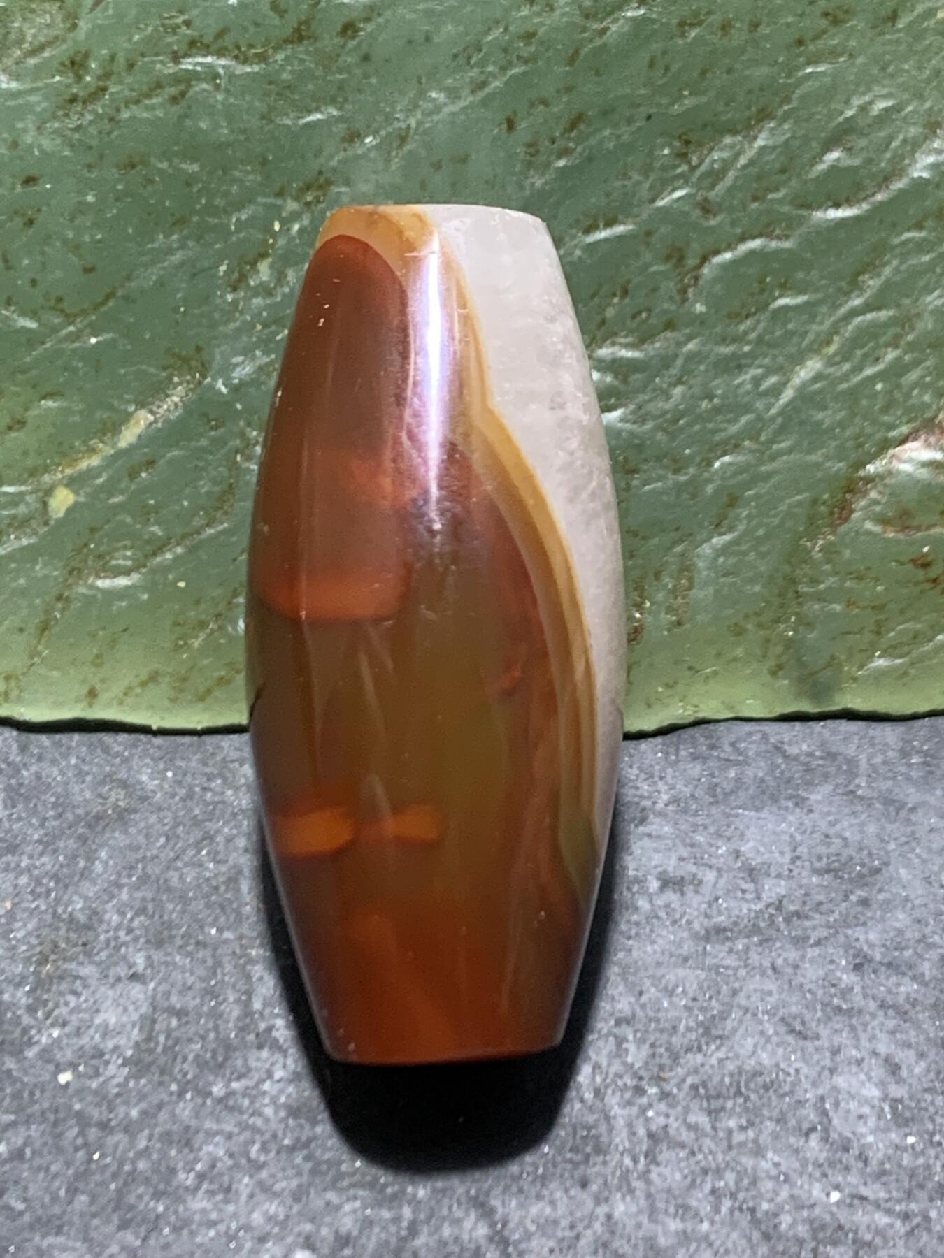 精美冰飘冻料战国红玛瑙天珠形桶珠一个，