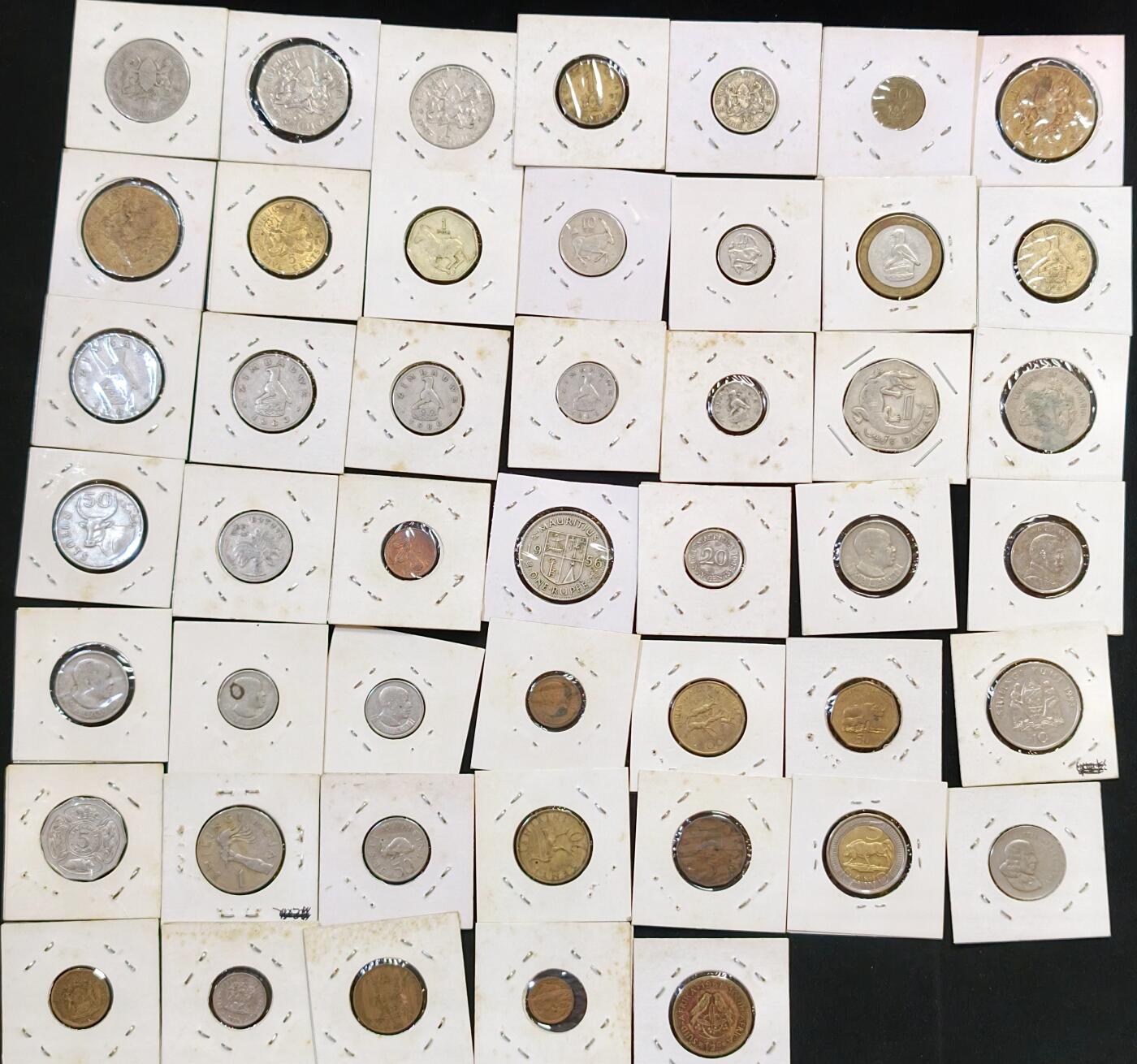 甄臻铺-世界币章拍卖（第53期），甄品场拍品征集中，送拍享返佣金等优惠多多 非洲8个国家45枚硬币，冈比亚5枚，津巴布韦7枚，博茨瓦纳3枚，肯尼亚9枚，南非7枚，坦桑尼亚8枚，马拉维6枚，毛里求斯2枚