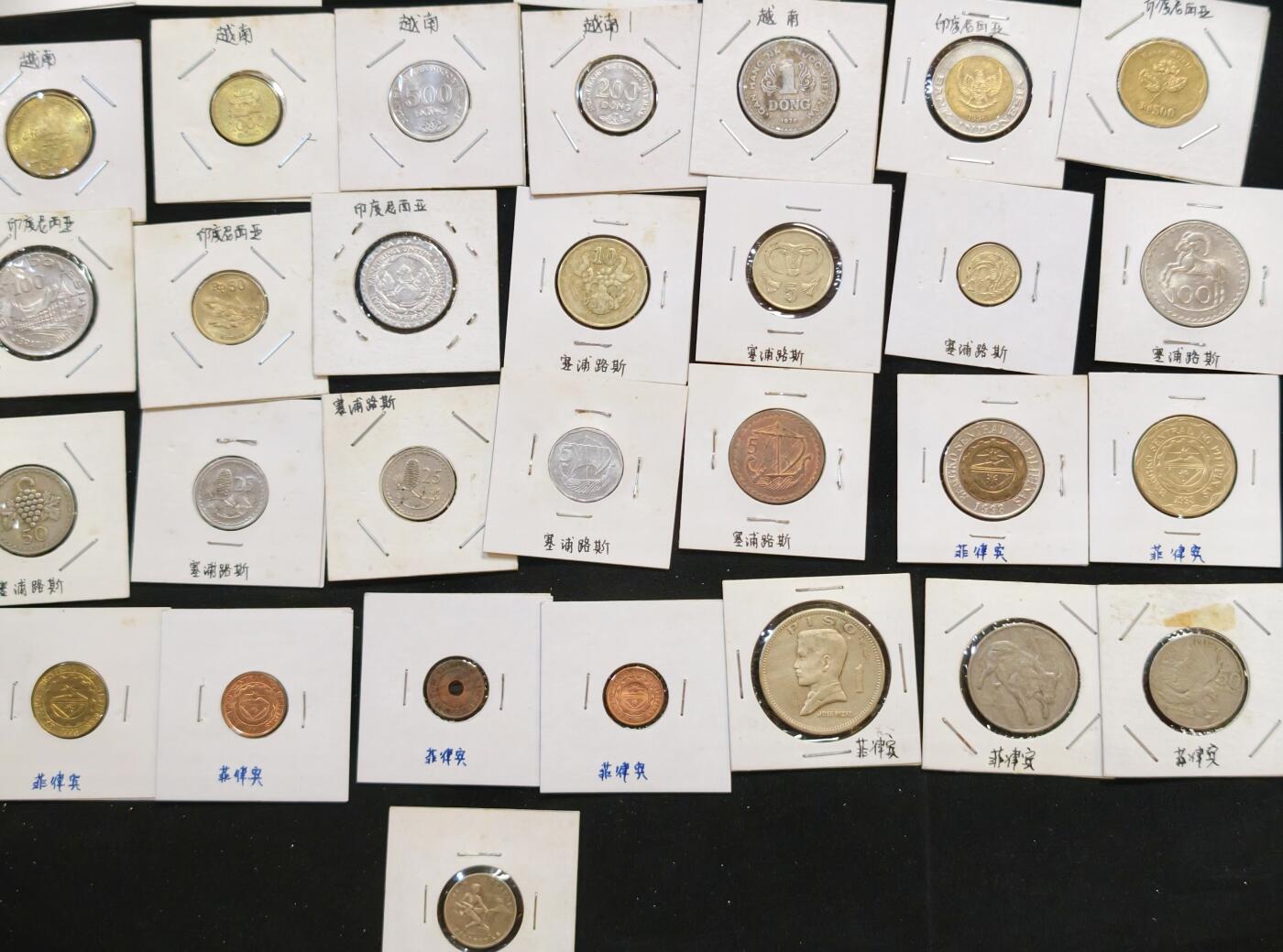 甄臻铺-世界币章拍卖（第53期），甄品场拍品征集中，送拍享返佣金等优惠多多 亚洲、大洋洲7个国家49枚硬币，印尼6枚，越南6枚，斯里兰卡4枚，新加坡5枚，菲律宾11枚，塞浦路斯10枚